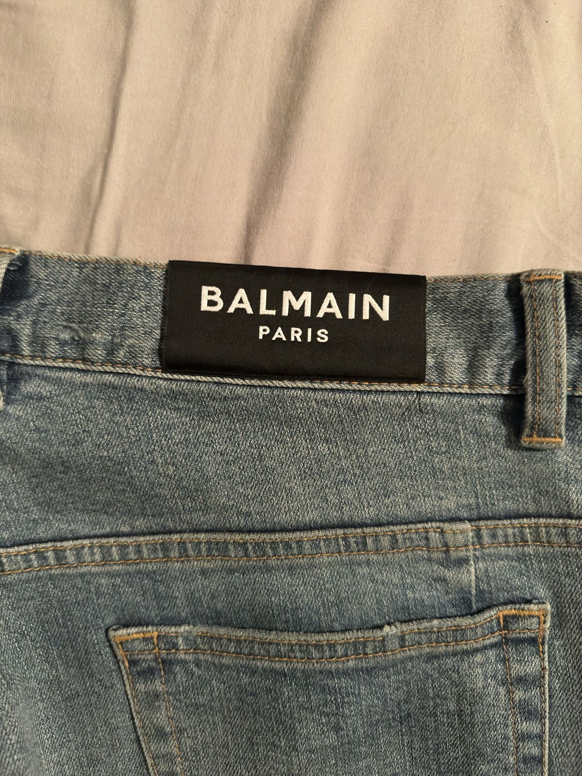 image of Balmain Paris Distressed Slim Fit Jeans in Blue, Men's (Size 35)