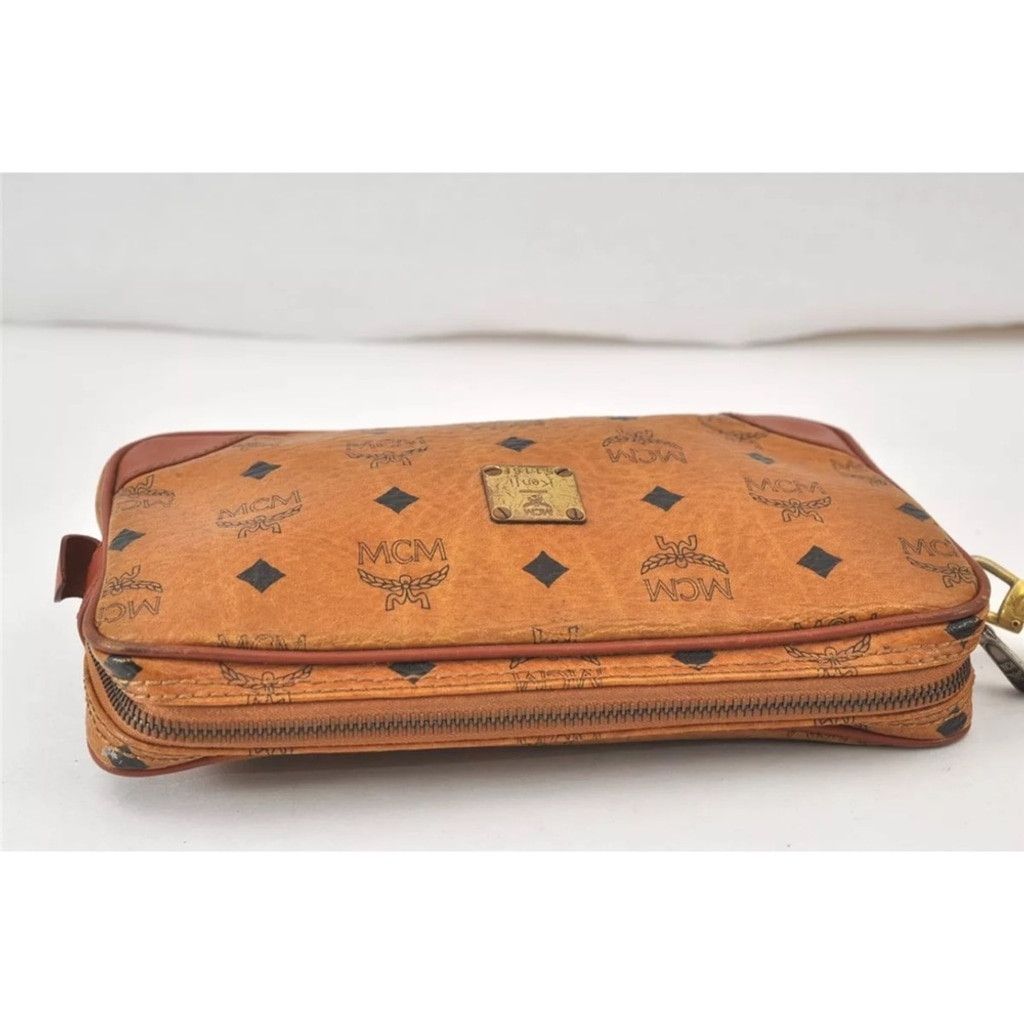 MCM MCM Brown Clutch with Logo Pattern and Wrist Strap Size ONE SIZE - 4 Thumbnail