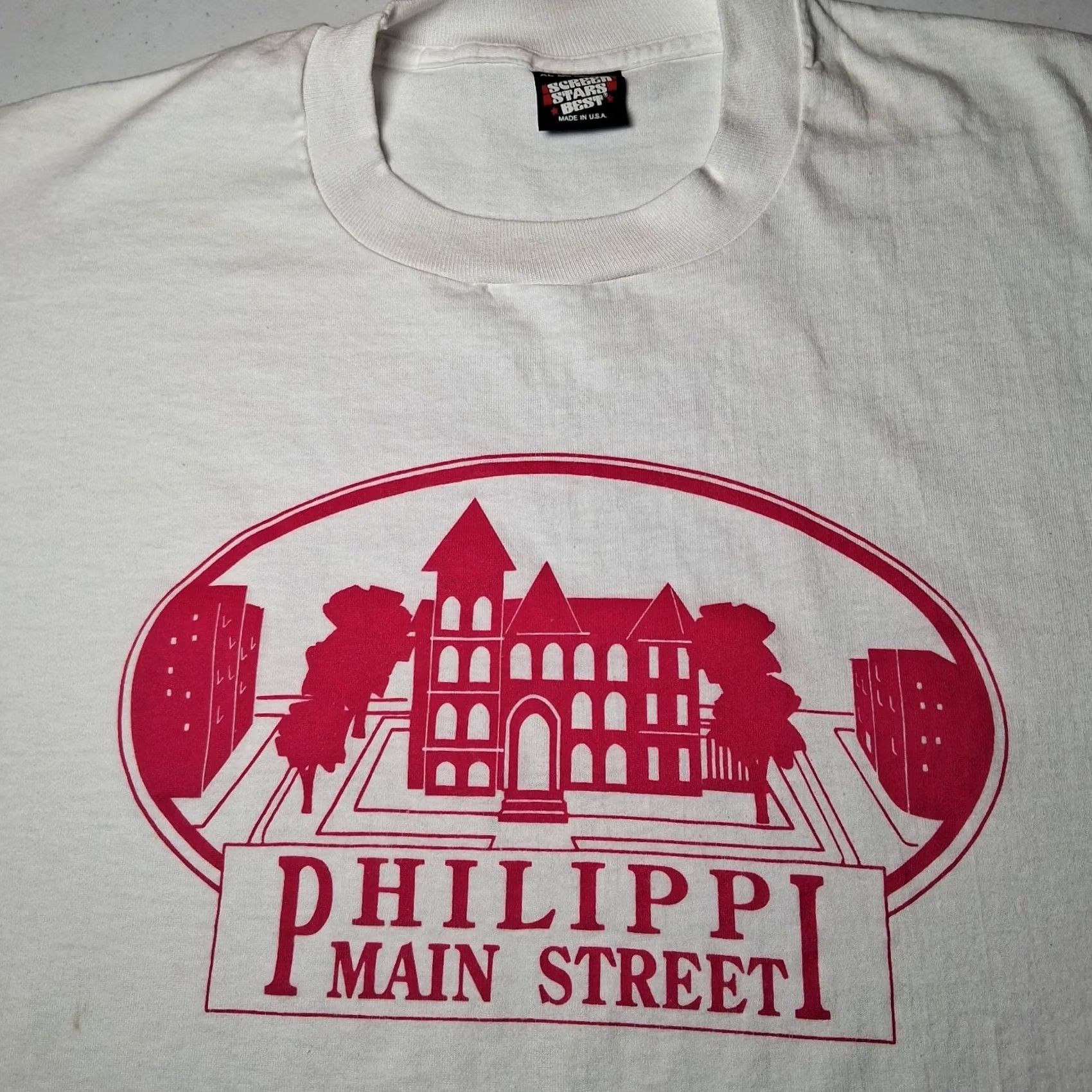 Vintage VINTAGE Screen Stars Best T-Shirt XL White Short Sleeve Crew Neck graphic WV Courthouse Main Street USA West Virginia Tourist Pink Vintage 60s? Size US XL / EU 56 / 4 - 2 Thumbnail