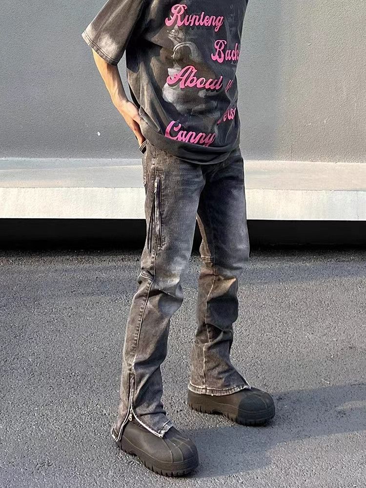 Vintage washed distressed hem zipper jeans