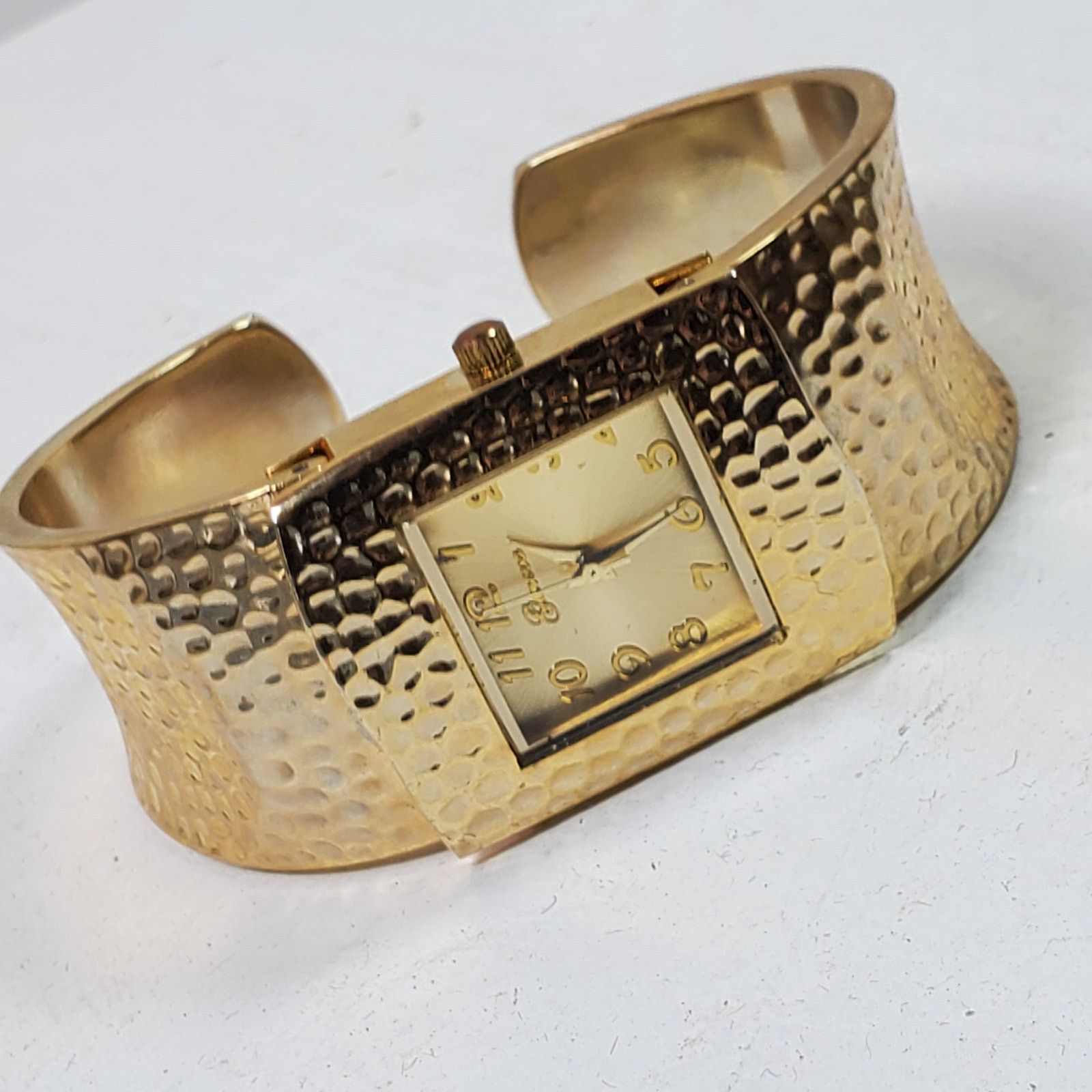 Geneva Geneva Hammered Metal Clamp Wristwatch Gold Tone Size ONE SIZE - 1 Thumbnail