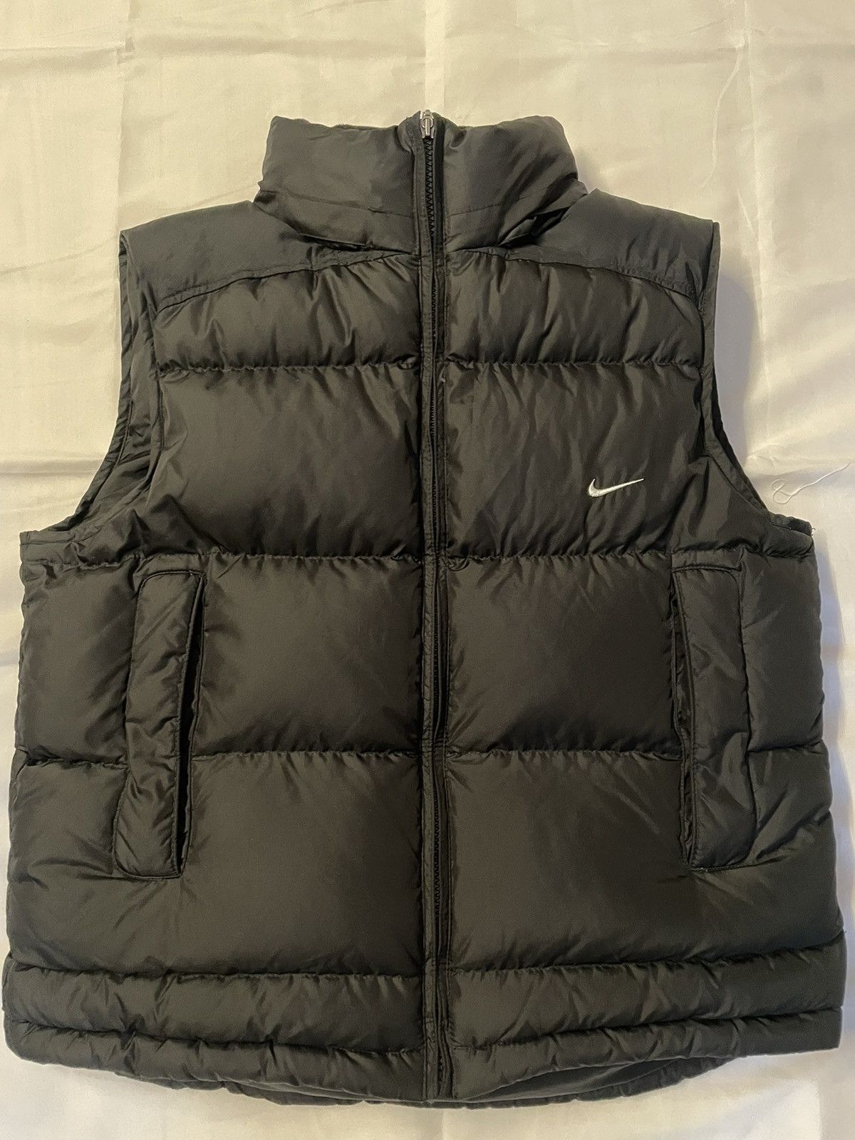 image of Nike Puffer Vest in Black, Men's (Size Small)