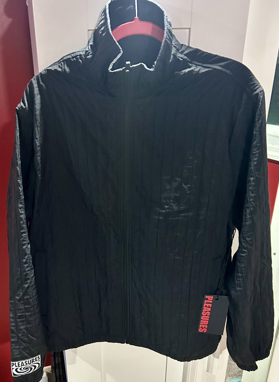 Pleasures PLEASURES Rescue Pleated Track Jacket – Black size large Size US L / EU 52-54 / 3 - 15 Thumbnail