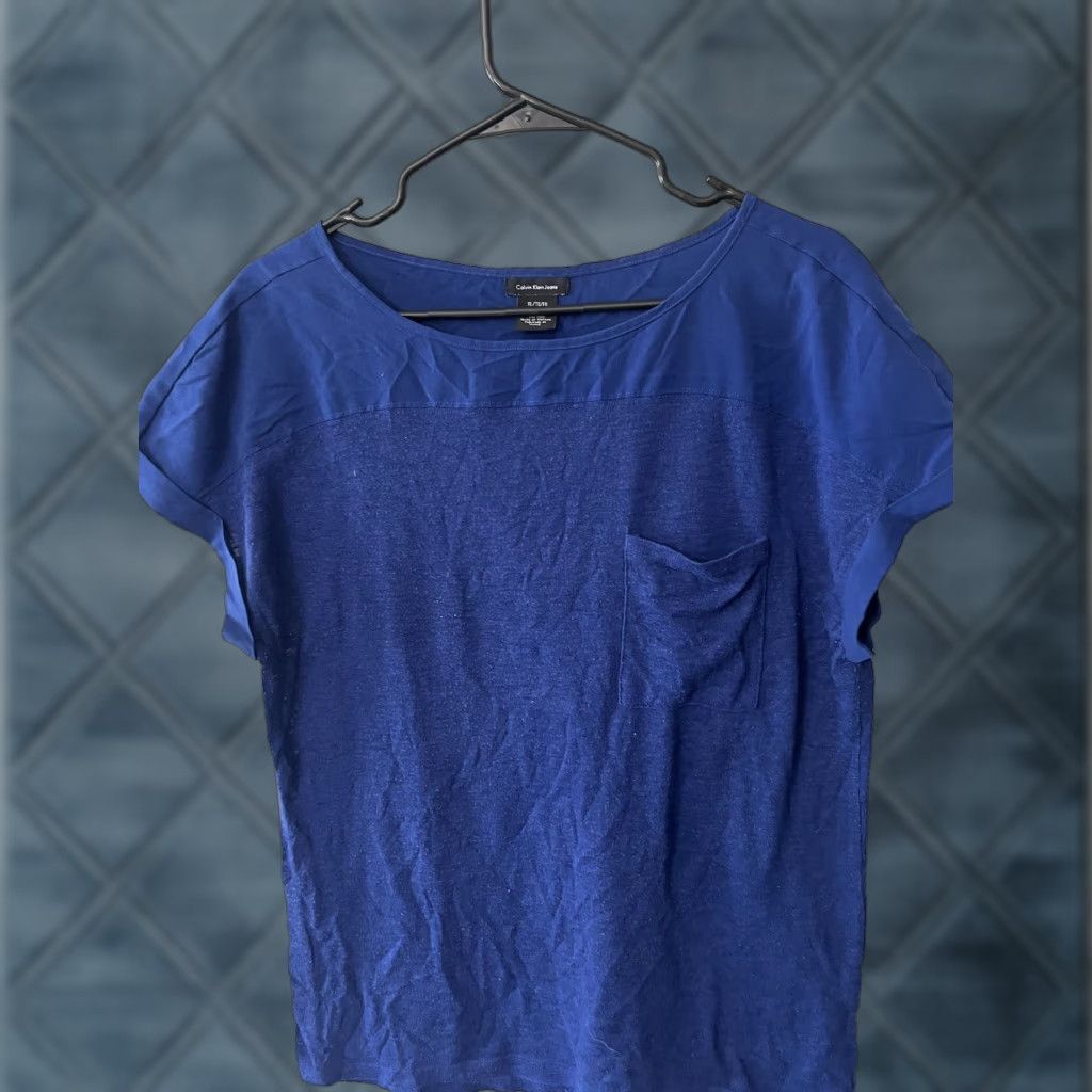 Calvin Klein Calvin Klein Women's Shirt T-Shirt Size XL Blue Cap Sleeve Solid Casual with Front Pocket Size XL / US 12-14 / IT 48-50 - 1 Thumbnail