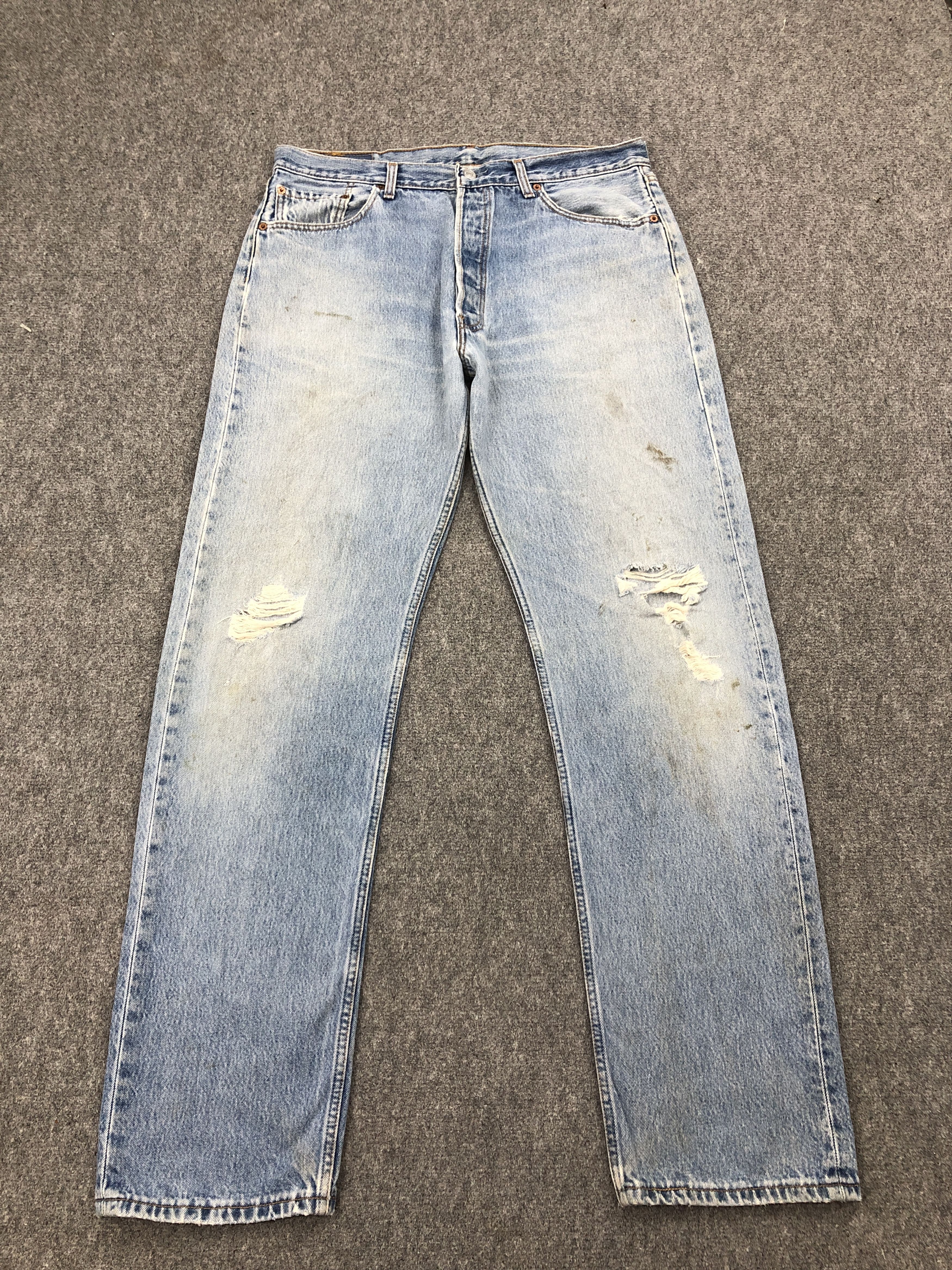 Vintage 90s Levis 501 Light Washed Distressed Jeans