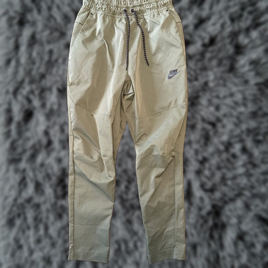 Nike Nike Sportswear Woven Tech Commuter Joggers Small Olive Drab Green CU4483-380 Size US 29 - 1 Thumbnail