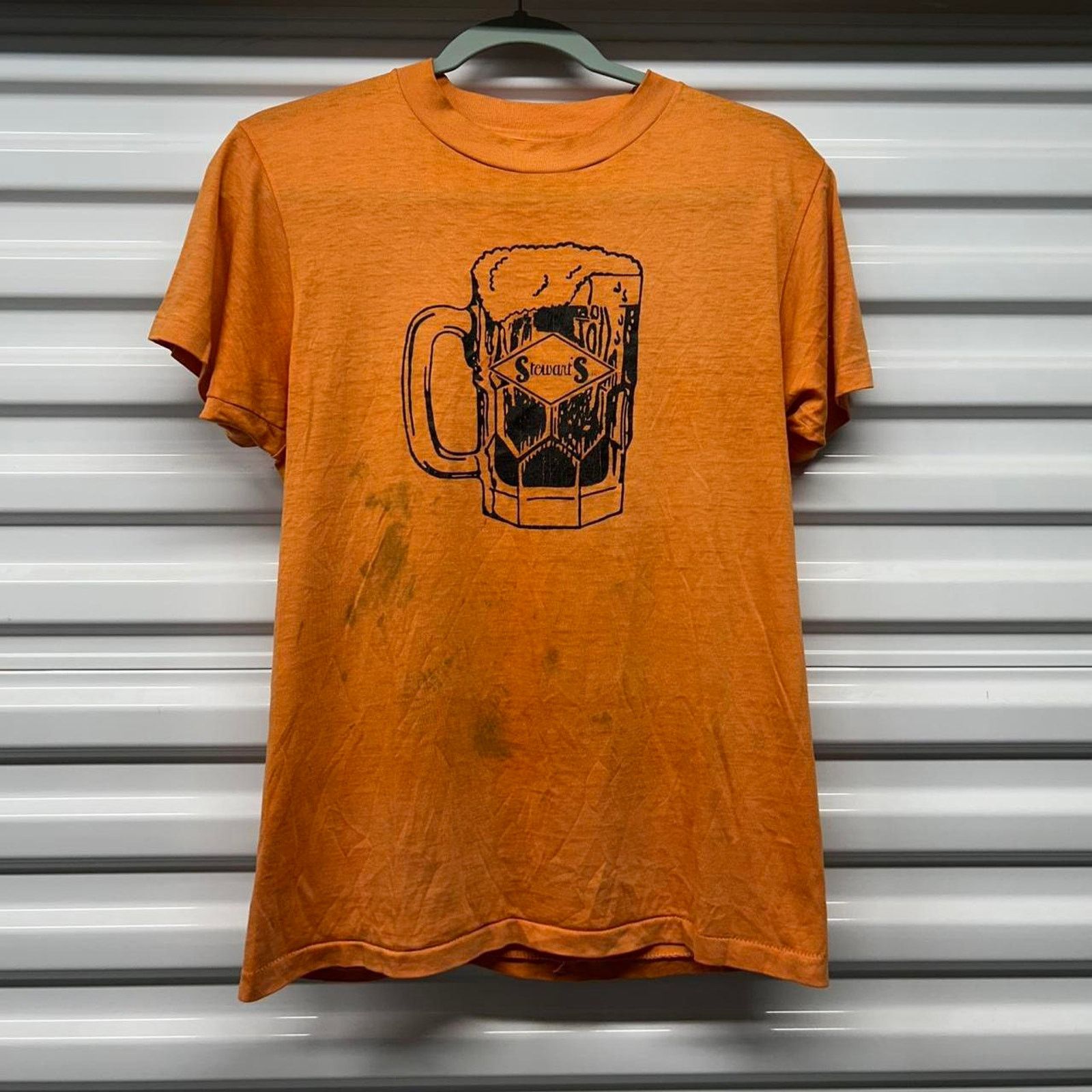 Other 70s orange vintage Stewart’s t-shirt with unique stains Size US L / EU 52-54 / 3 - 8 Thumbnail