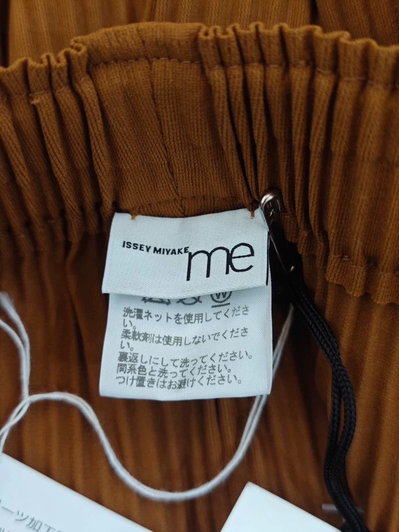Issey Miyake Issey Miyake size:one size Orange pleated wide-leg pants Size 23" - 7 Thumbnail