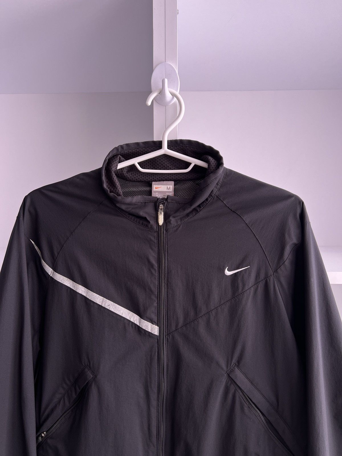 Vintage Nike Light 90s style windbreaker jacket