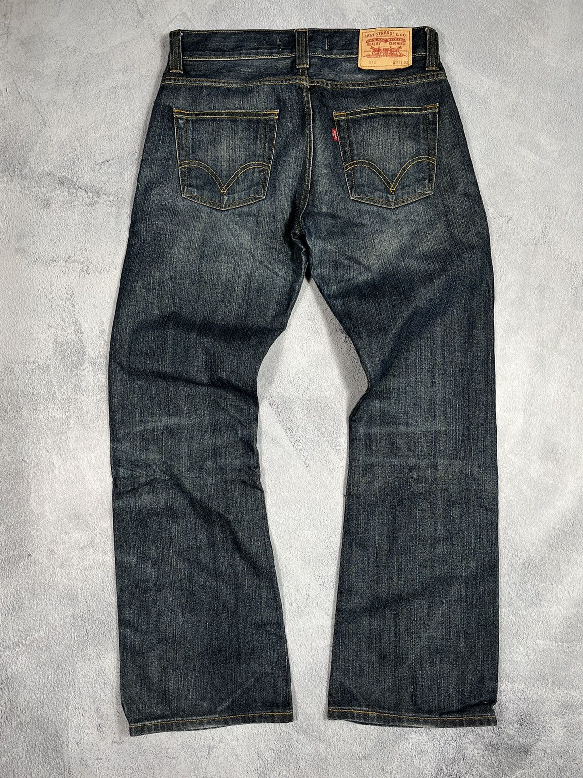 Vintage Levi’s 512 bootcut flared faded jeans streetwear 32