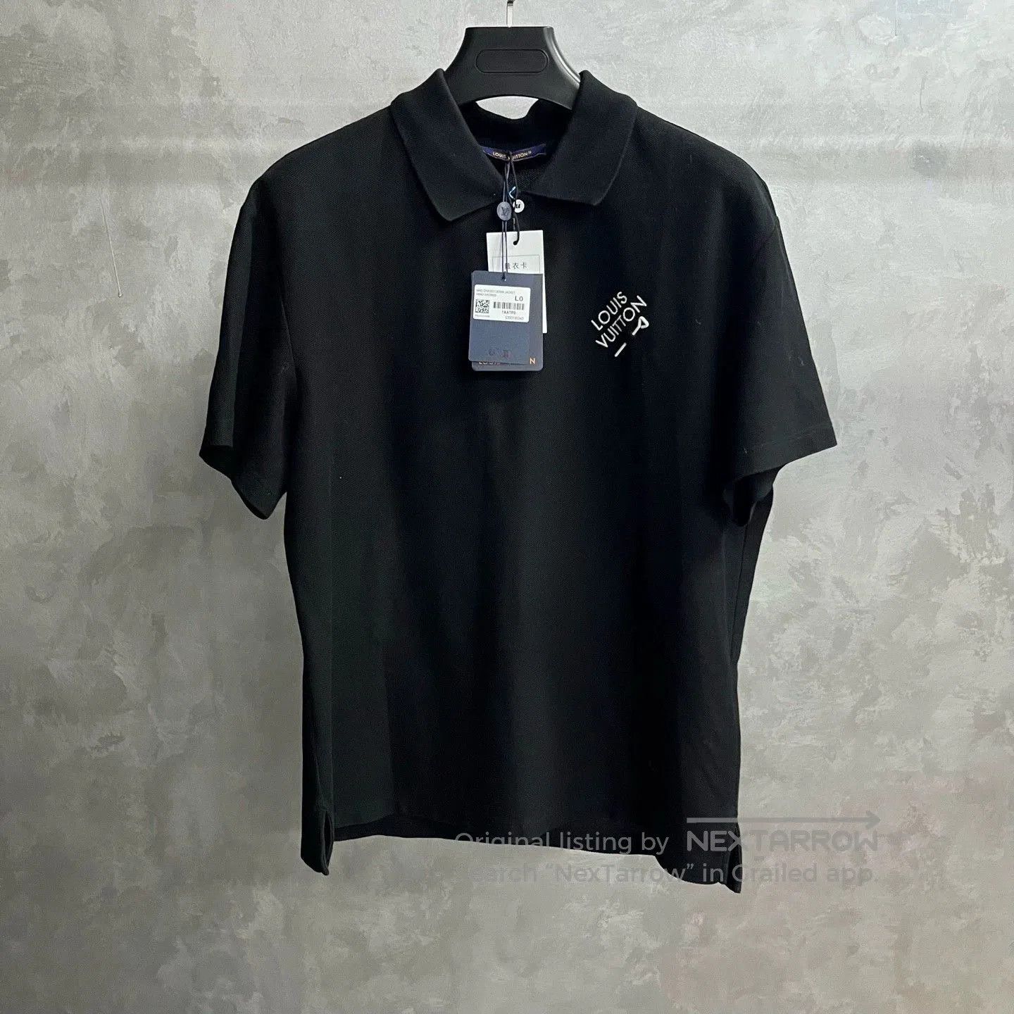 black louis vuitton embroidered logo polo shirt.