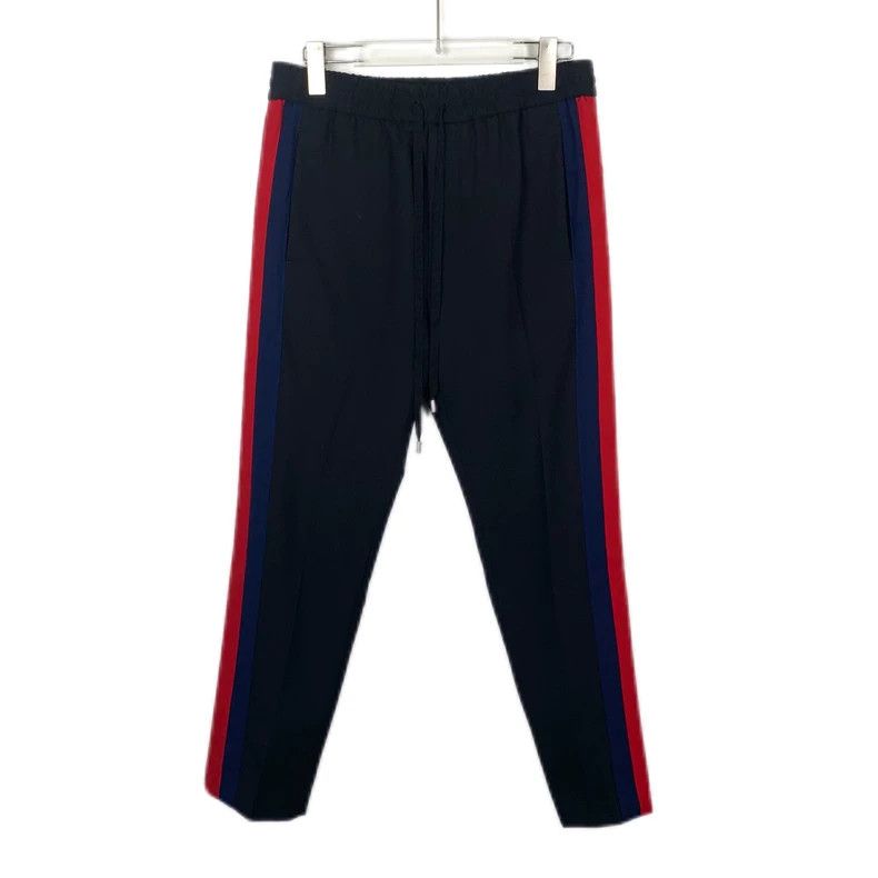 Gucci Black striped wool casual pants 2502-Nextarrow