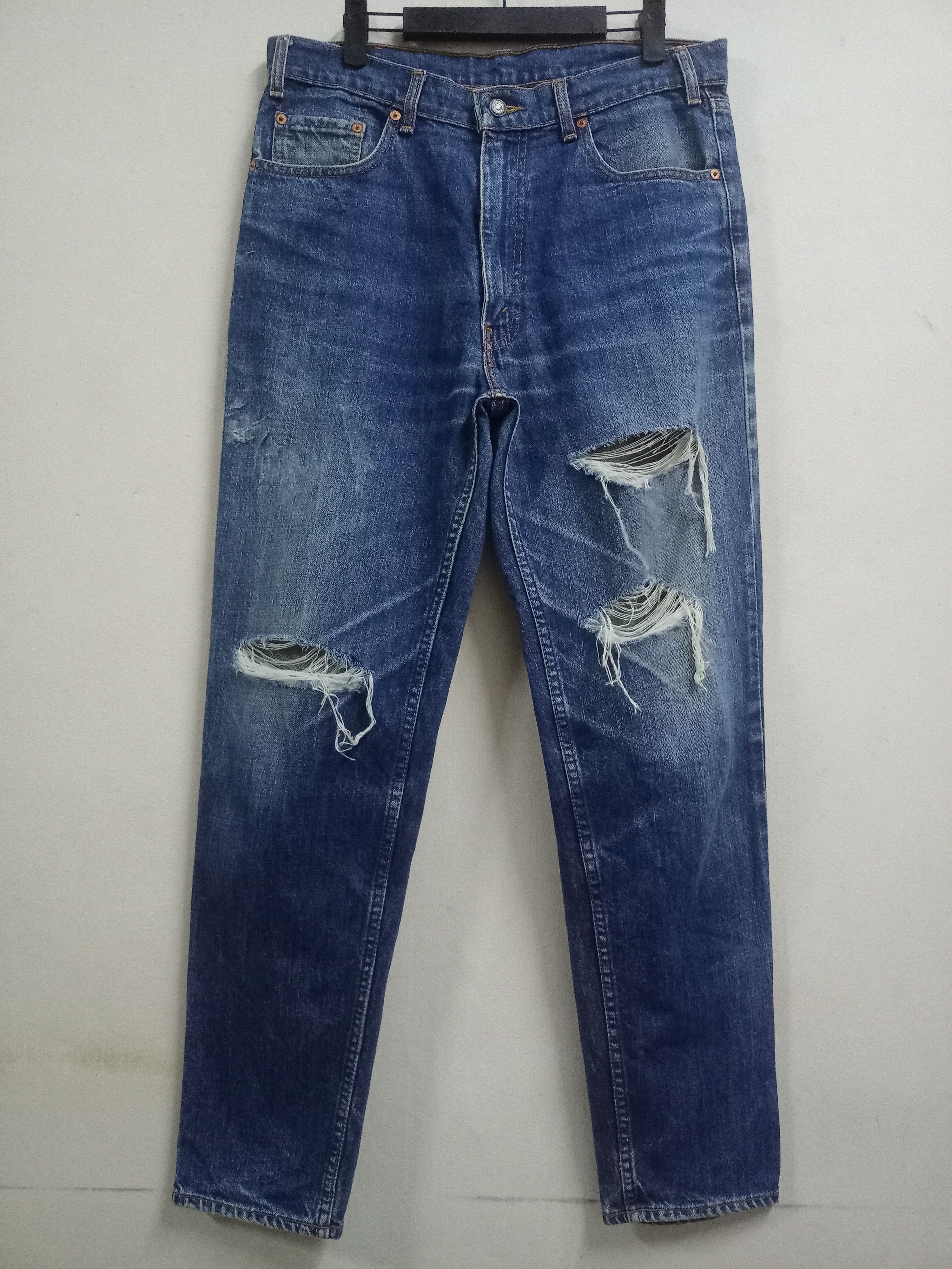 Levi s Vintage Levis 603 0217 Blue Wash Ripped Style Jeans 33x30 Grailed