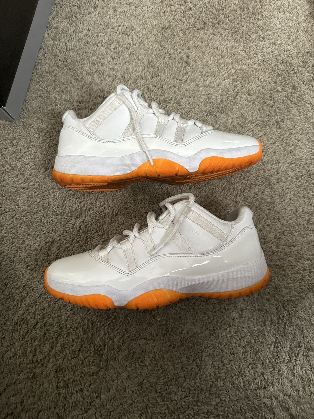 image of Jordan Brand 11 Low ‘Citurs’ Shoes in Orange/White, Women's