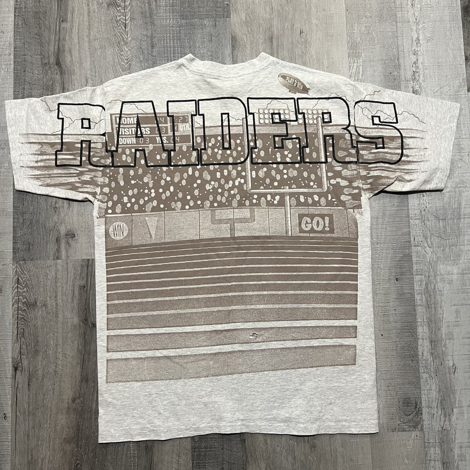 Vintage VTG Raiders All Over Print Grey Football T Shirt 90s Size XL Size US XL / EU 56 / 4 - 2 Thumbnail