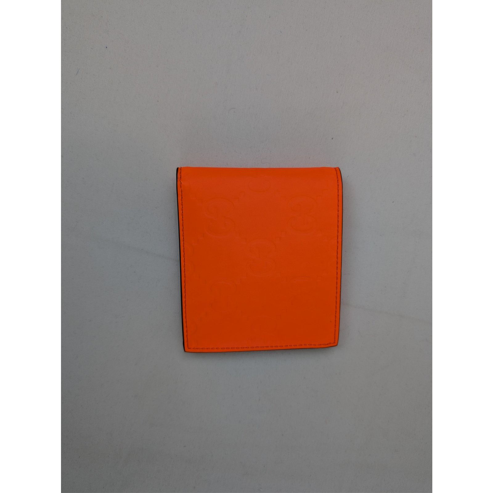 o1rshd1 Size: OS / GG Rubber Effect Bi-Fold Wallet in Orange