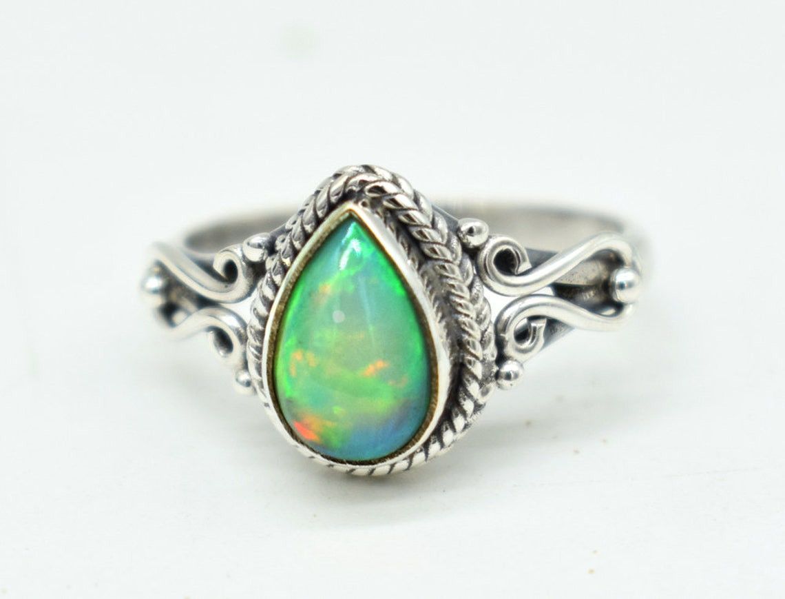 Handmade Ethiopian Opal Ring: Pear-Shaped Gemstone, 925K Silver Size ONE SIZE - 1 Thumbnail