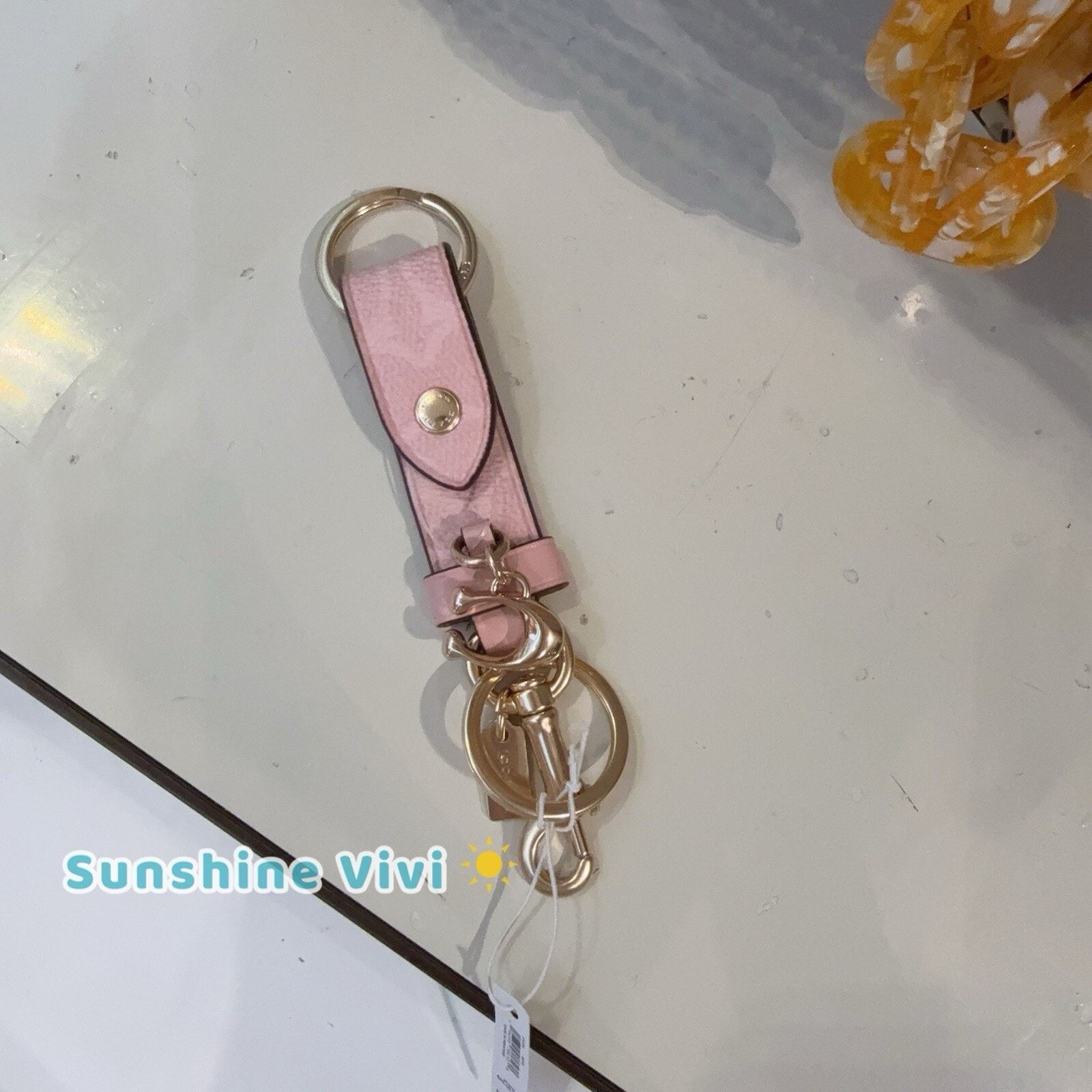 Coach NWT COACH CAU86 Trigger Snap Bag Charm Powder Pink Key Chain Size ONE SIZE - 1 Thumbnail