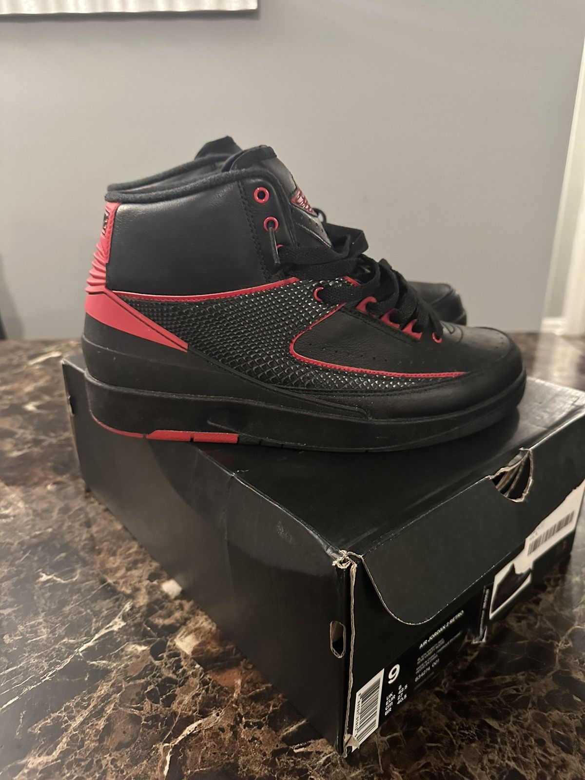 image of Air Jordan 2 Retro Alternate Shoes in Black, Men's (Size 9)