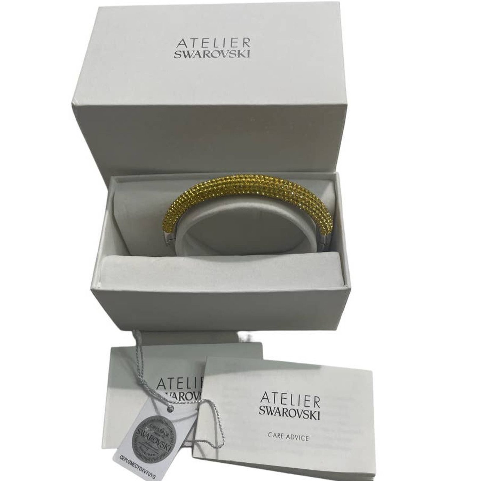 Swarovski Atelier Tigris bangle Yellow Rhodium plated L
