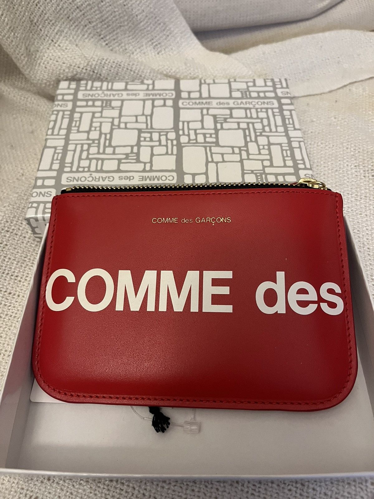 image of Comme Des Garcons Comme Des Garçons Huge Logo Red Zippered Wallet Pouch, Men's