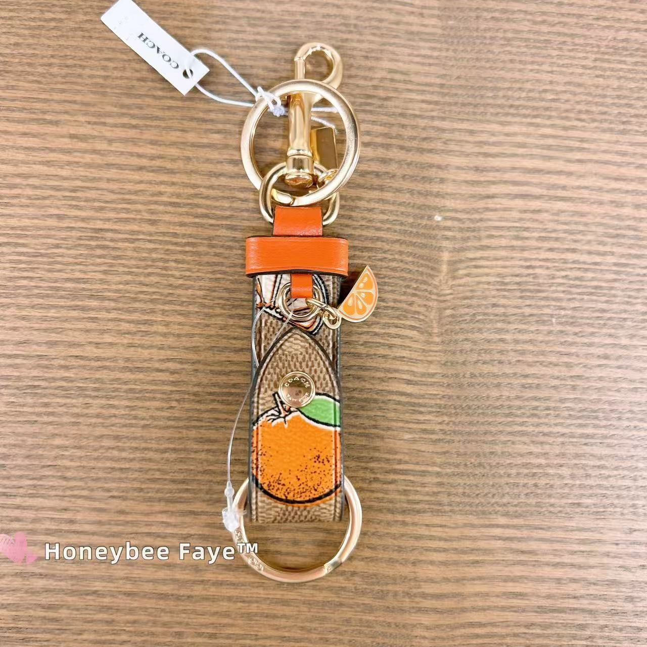 Coach Trigger Snap Bag Charm In Signature Canvas With Orange Print Size ONE SIZE - 2 Thumbnail