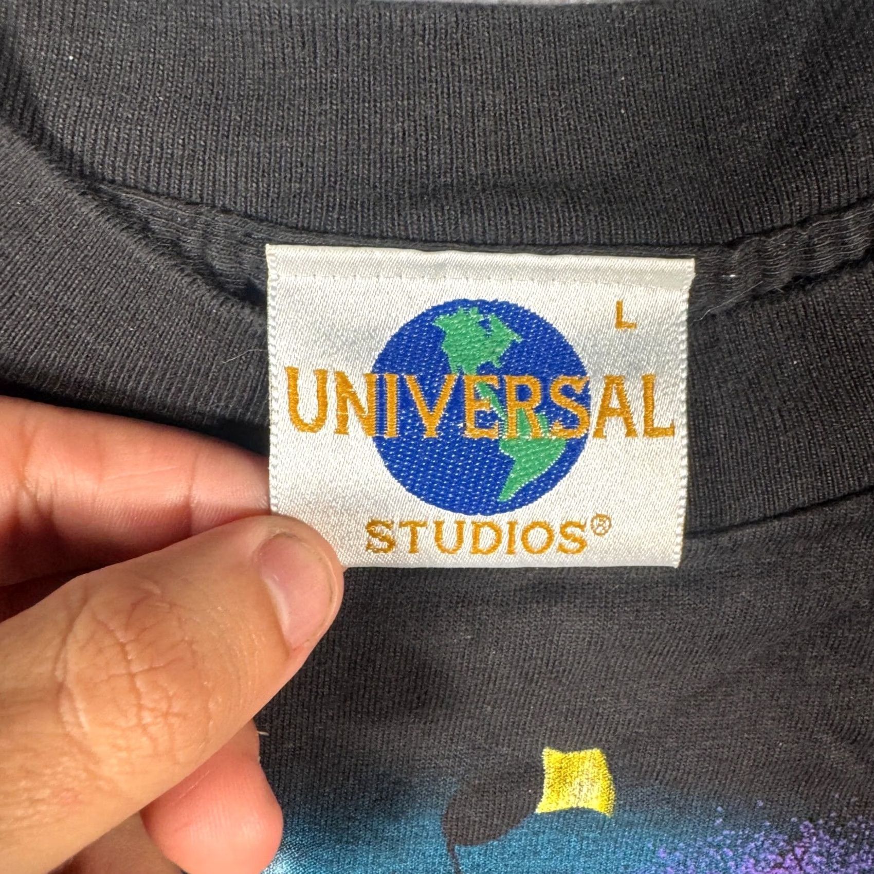 Vintage VINTAGE Universal Studios Mardi Gras Shirt Men Large Black 1997 Graphic Tee Short Sleeve Crew Neck Logo 100% Cotton Knit One Size M Adult Mens? Size US M / EU 48-50 / 2 - 3 Thumbnail