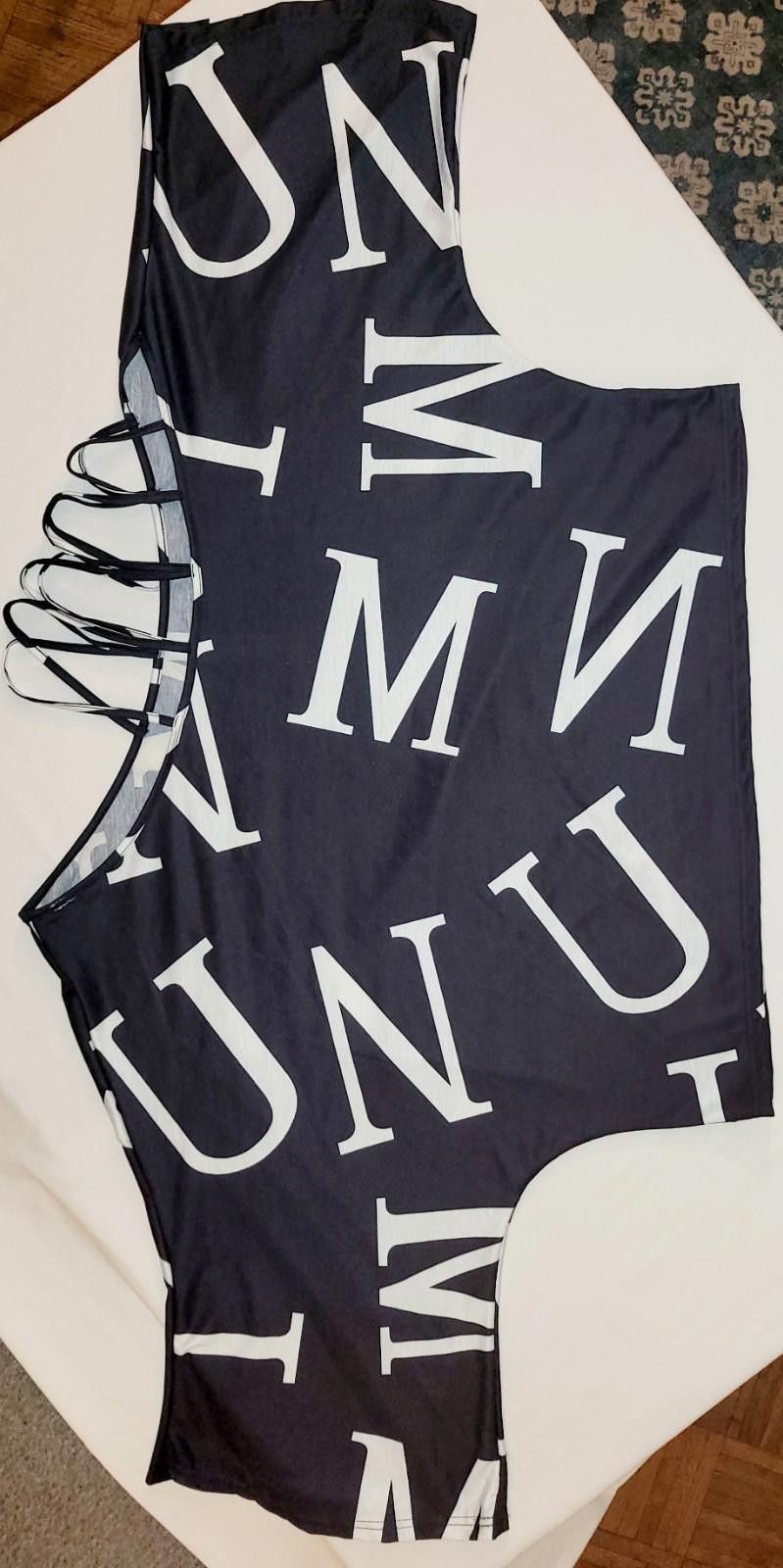 The Unbranded Brand women's 2XL asymetric blk. blouse w/ wht. block letters Size XXL / US 16-18 / IT 52-54 - 1 Thumbnail