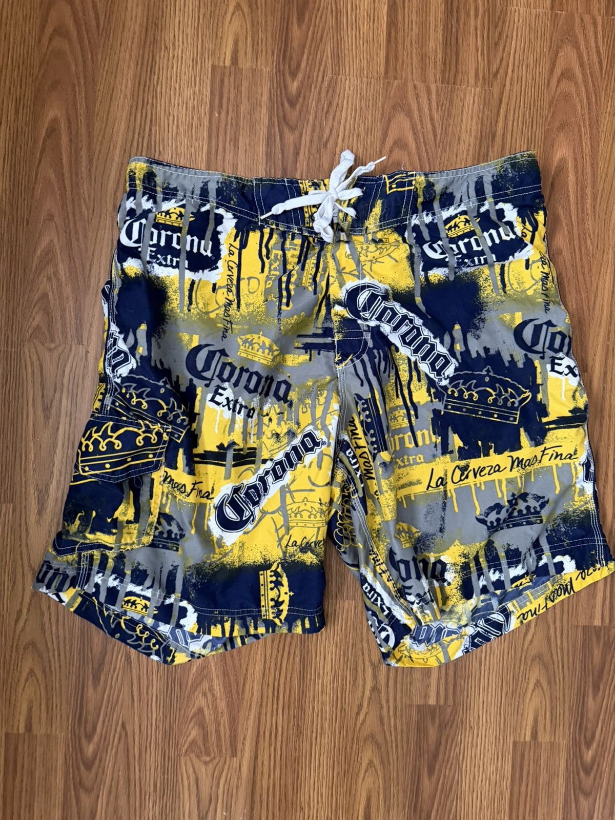 Other Corona Extra men's board shorts swim trunks size large. Size US 37 - 1 Thumbnail
