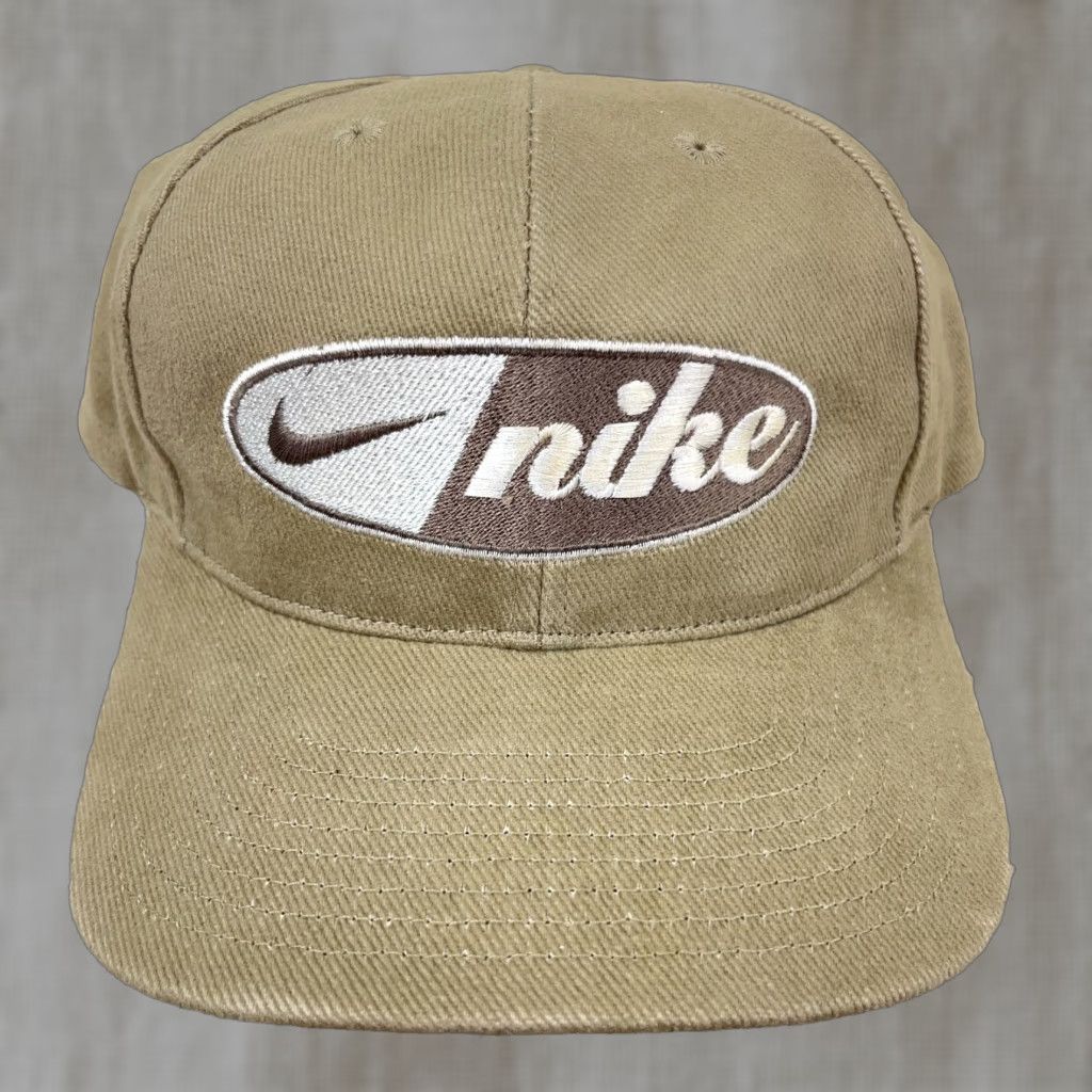Nike VINTAGE Nike Hat Cap Snapback Brown Tan Swoosh Spell Out 90s Taiwan Rare Khaki Mens One Size Brown Nike Hat Snapback 90s Taiwan Rare Khaki Size ONE SIZE - 1 Thumbnail