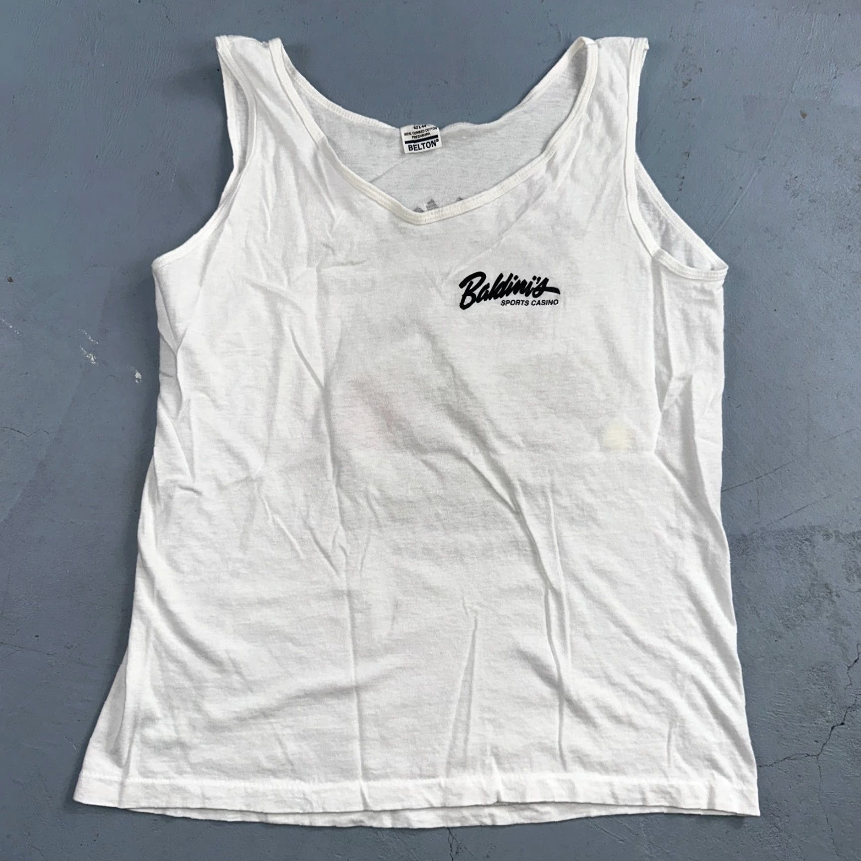 Spalding VINTAGE Belton Got Balls Spalding Basketball VTG T Shirt White Tank 80s 90s 70s Mens L White Crew Neck Short Sleeve Graphic Print Jeans? Size US L / EU 52-54 / 3 - 5 Thumbnail