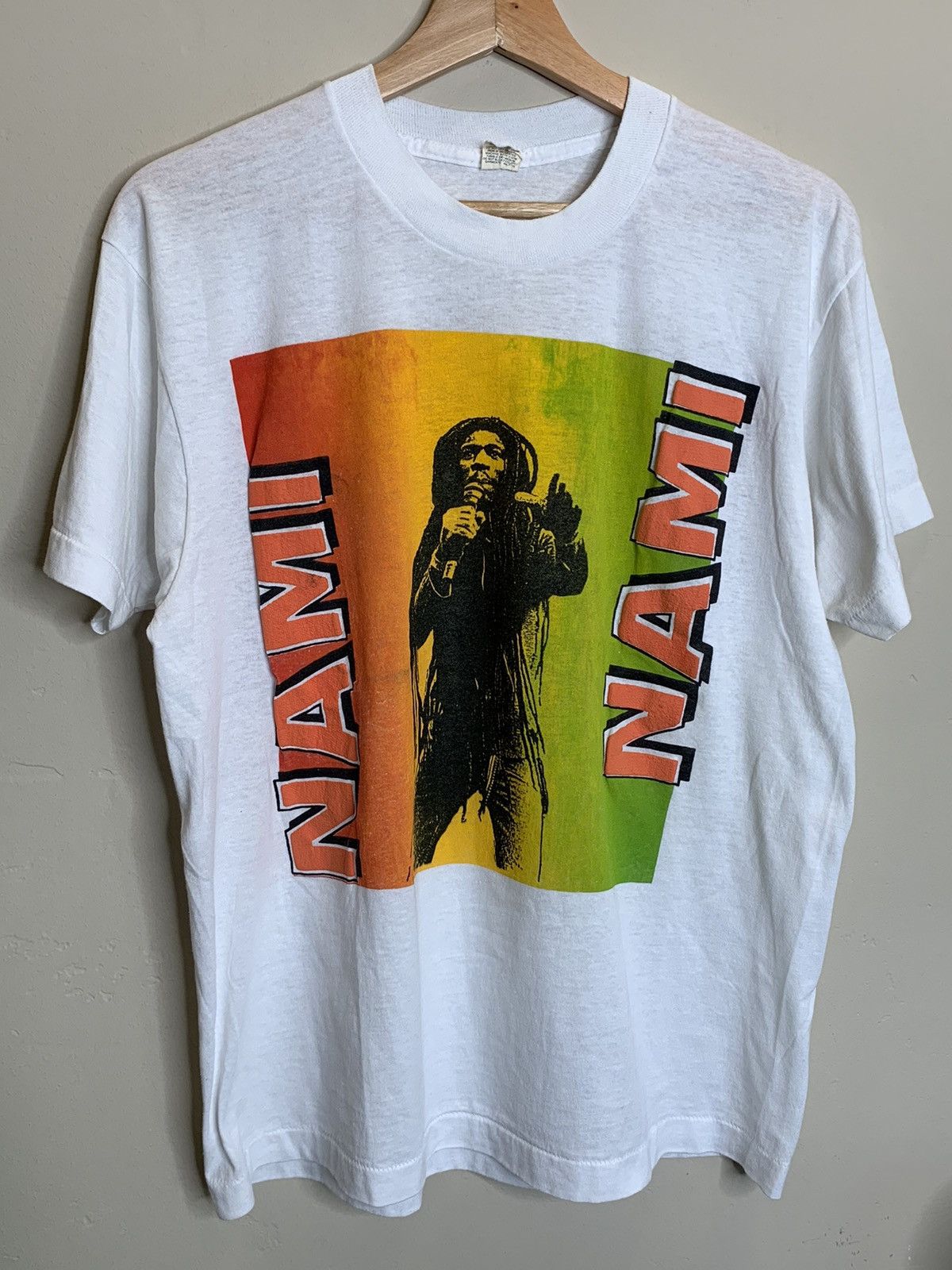 image of Made In USA x Screen Stars Vintage Nami Nami Jamaazima Stand & Be Counted Shirt in White/Orange/Yel