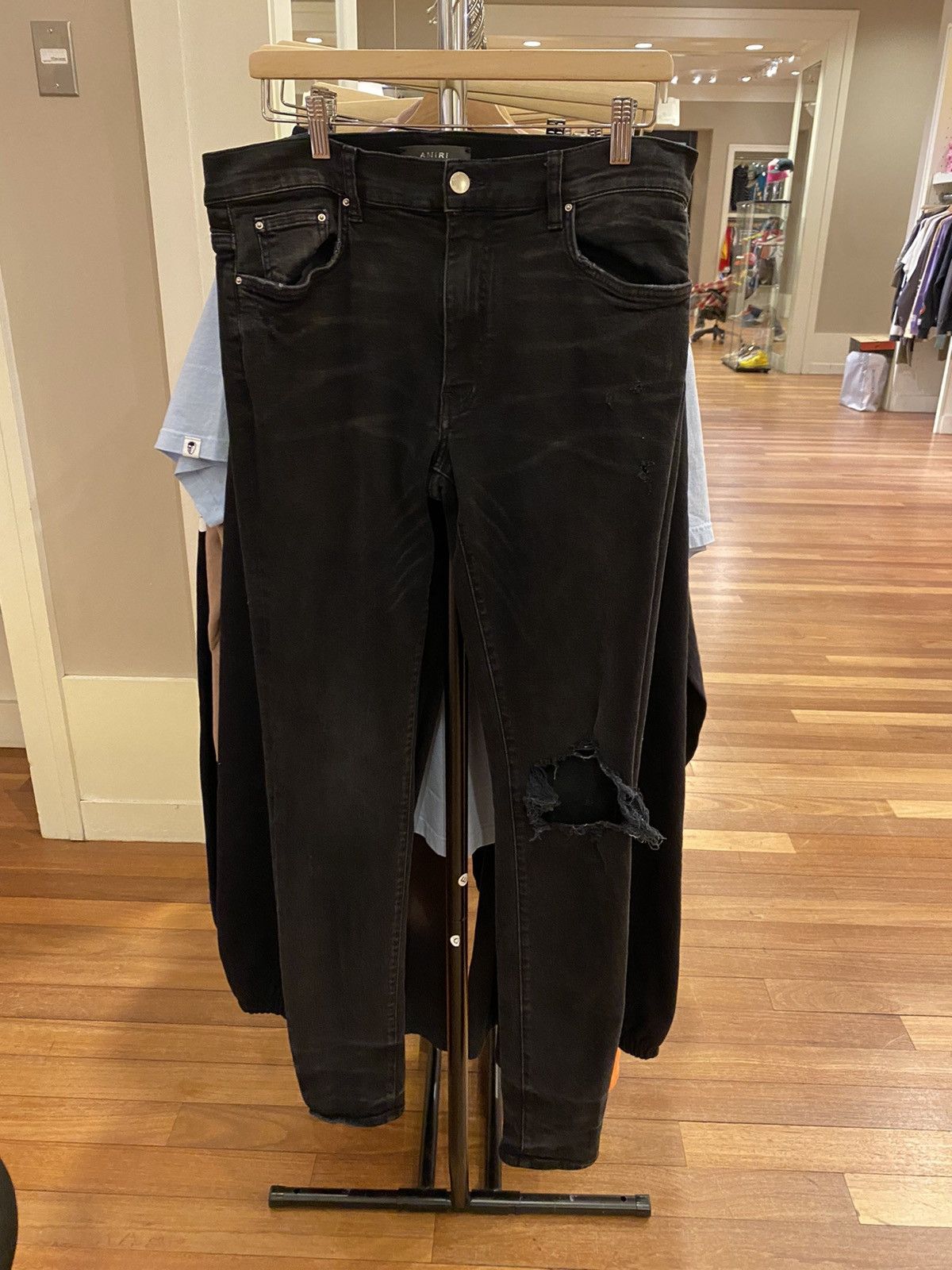 image of Amiri Ripped Black Denim in Indigo, Men's (Size 31)