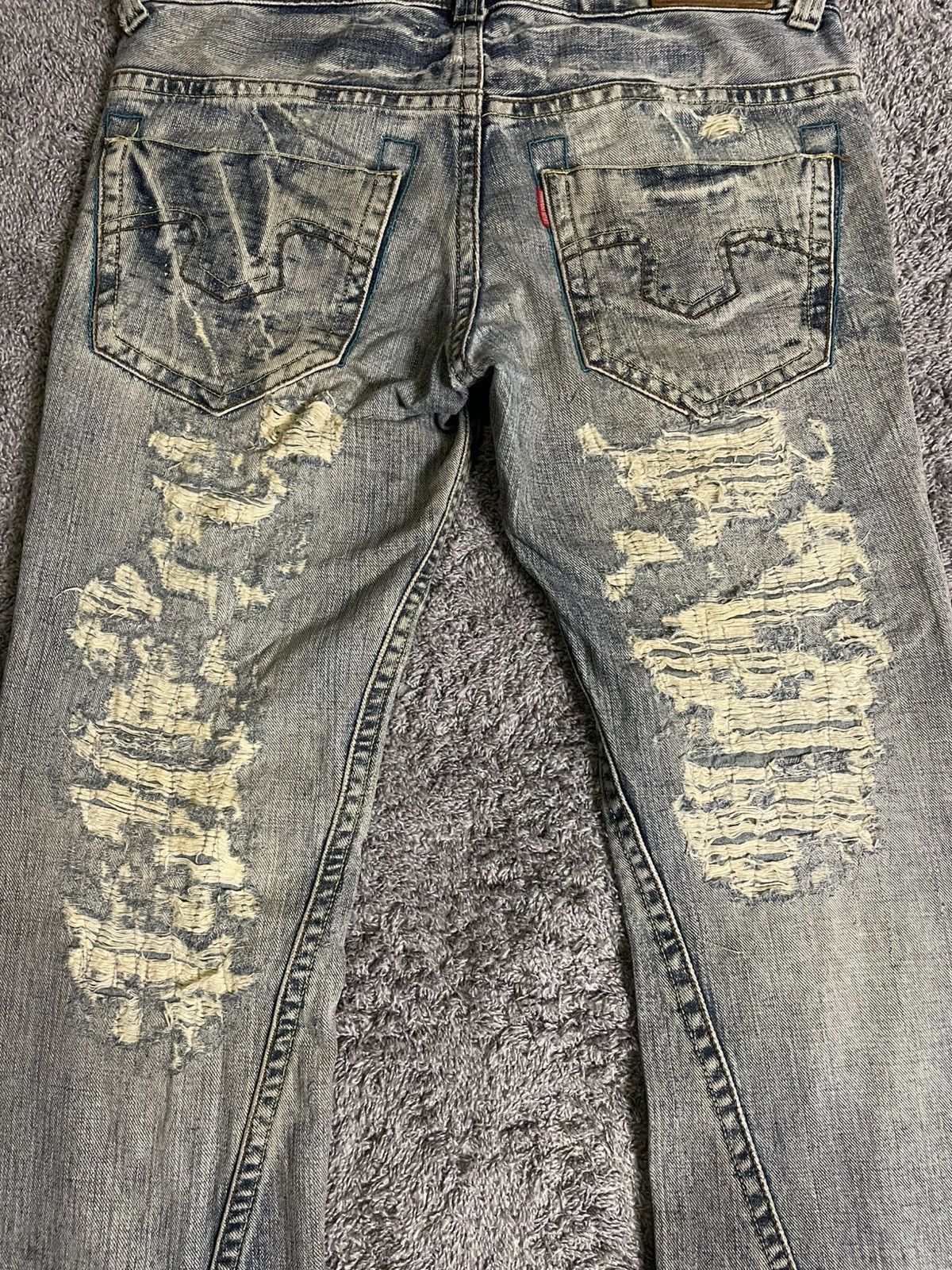 Tornado Mart Distressed Flared Jeans