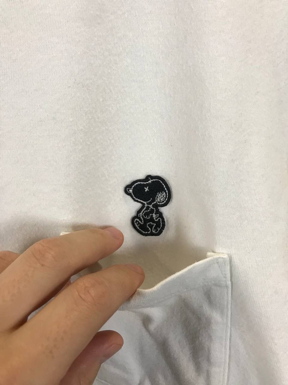 Kaws × Peanuts × Uniqlo Kaws x Peanuts x Uniqlo pocket designer tee Size US M / EU 48-50 / 2 - 3 Thumbnail