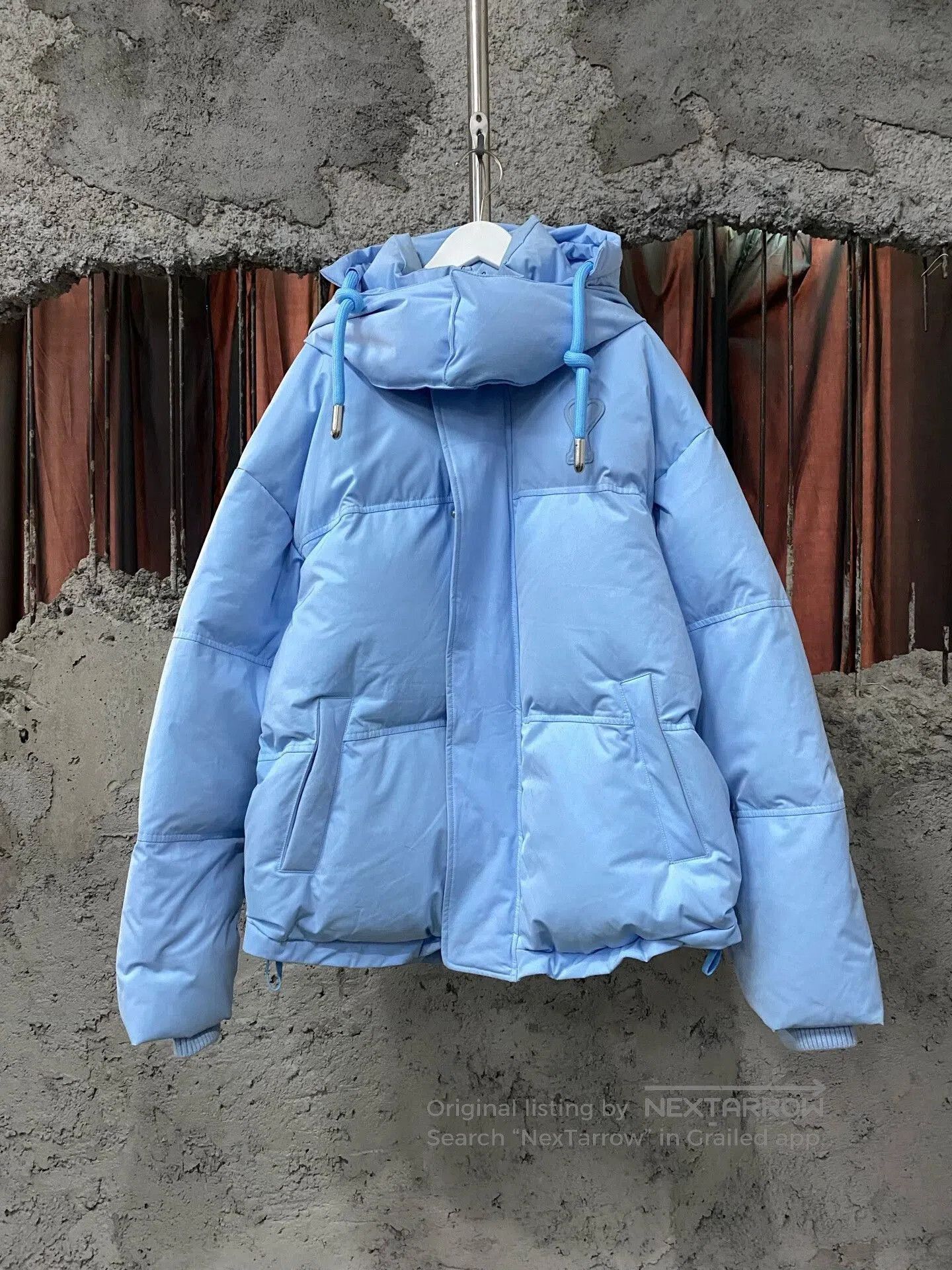 stylish light blue puffer jacket.