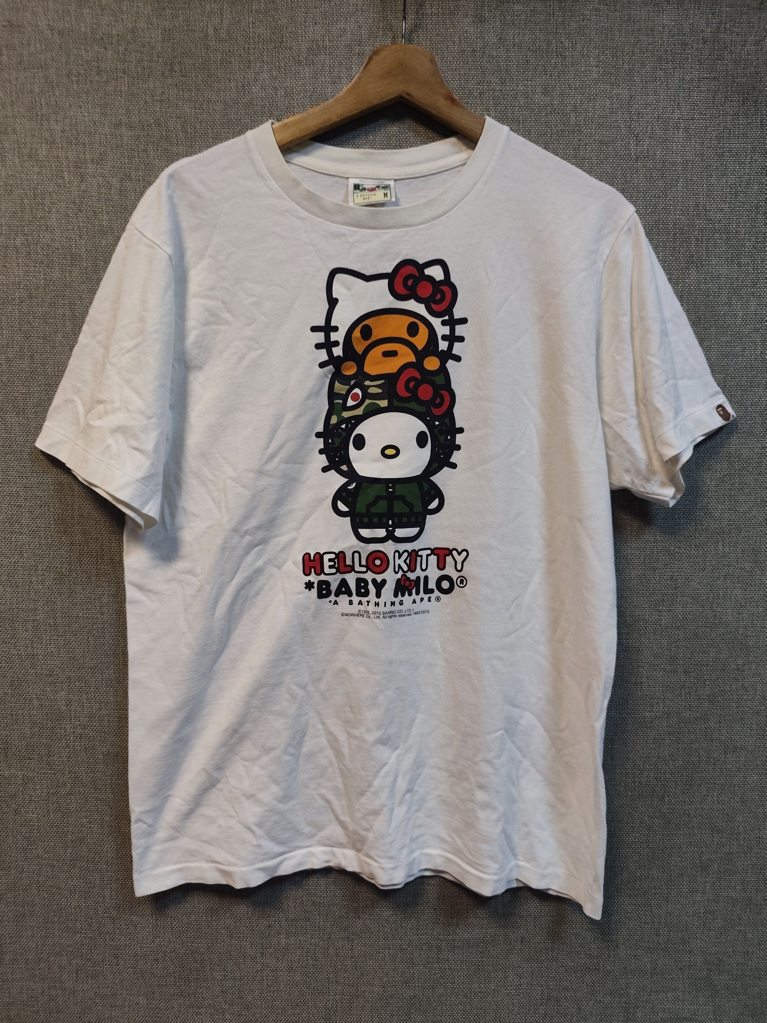 トップス BAPE X HELLO KITTY COLLEGE TEE 140cm BAPE® LADIES'】 BAPE®︎ X HELLO KITTY COLLEGE MINI TEE Is Now