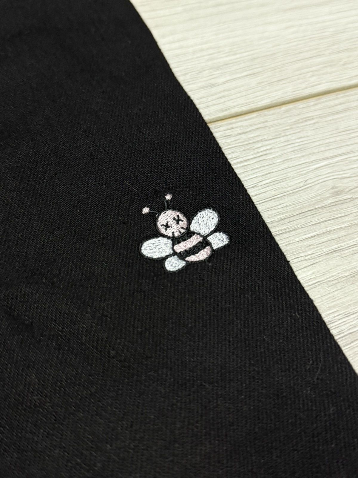 Dior × Kaws Dior x Kaws bugs slim jeans pants all over buttons Size US 33 - 4 Thumbnail