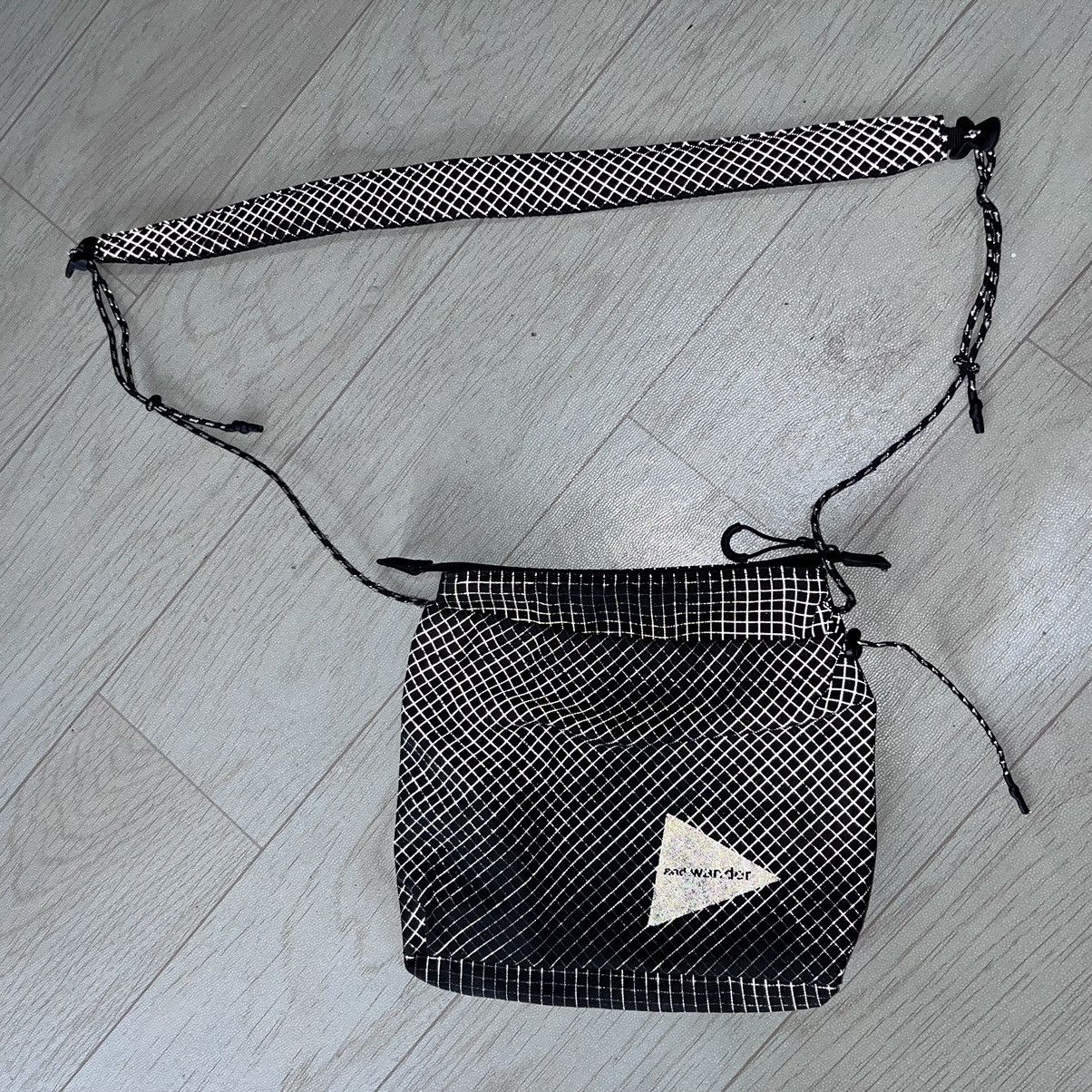 And Wander Sacoche slingbag reflective