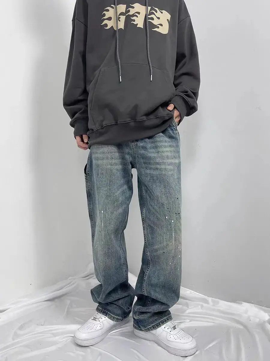 Vintage street inked washed and distressed baggy jeans