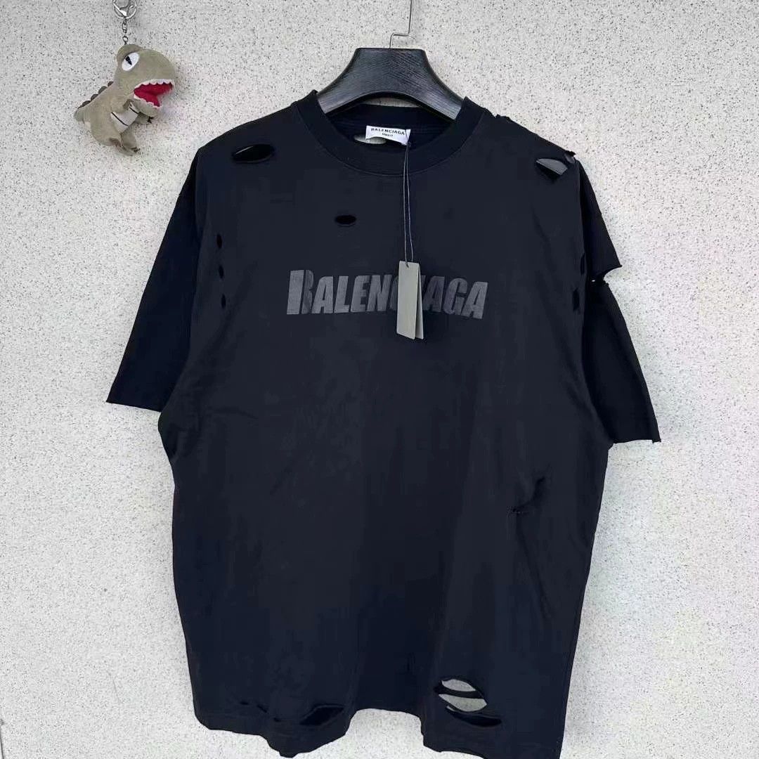 Balenciaga Balenciaga new pure black perforated short sleeved shirt Size US S / EU 44-46 / 1 - 1 Thumbnail
