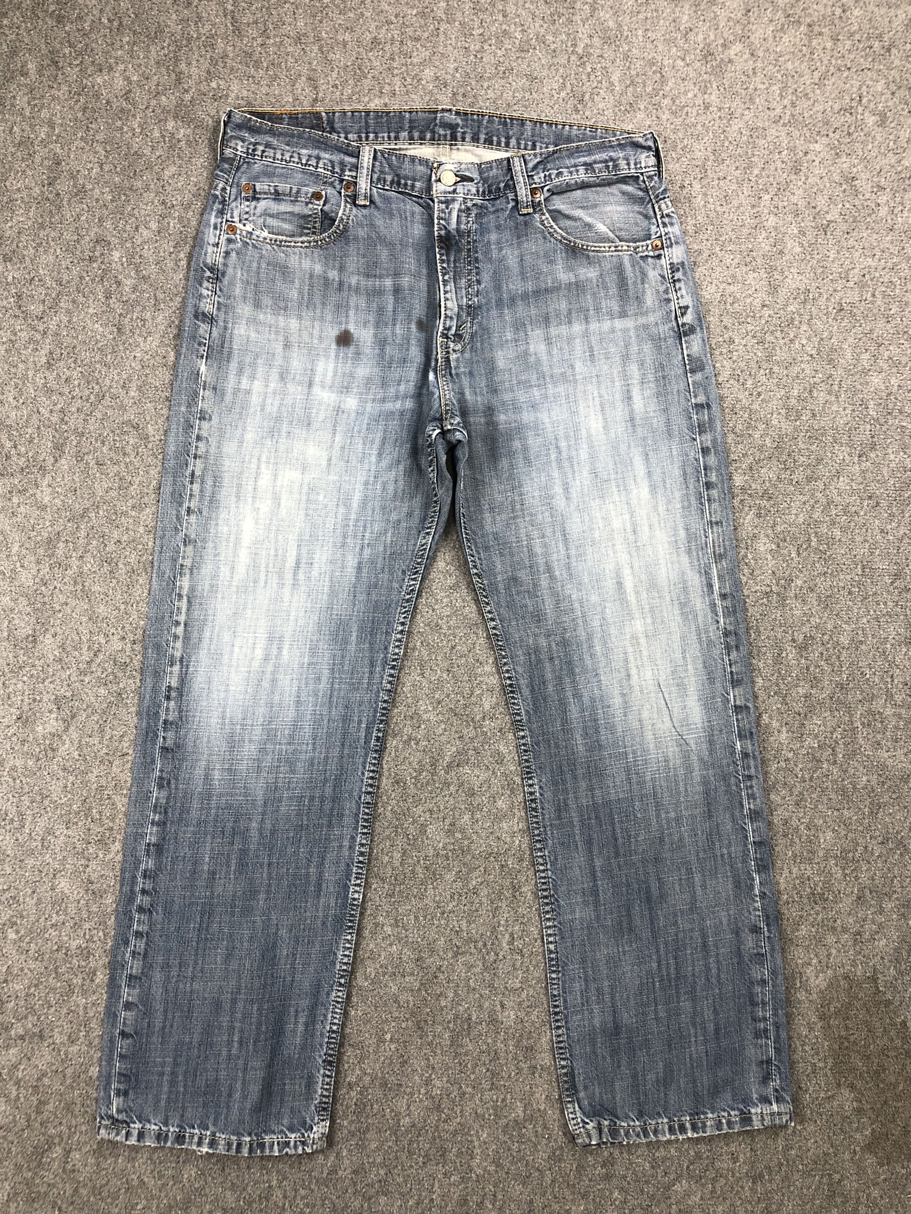 image of Faded Blue Vintage Levis 569 Loose Jeans in Blue Denim, Men's (Size 34)