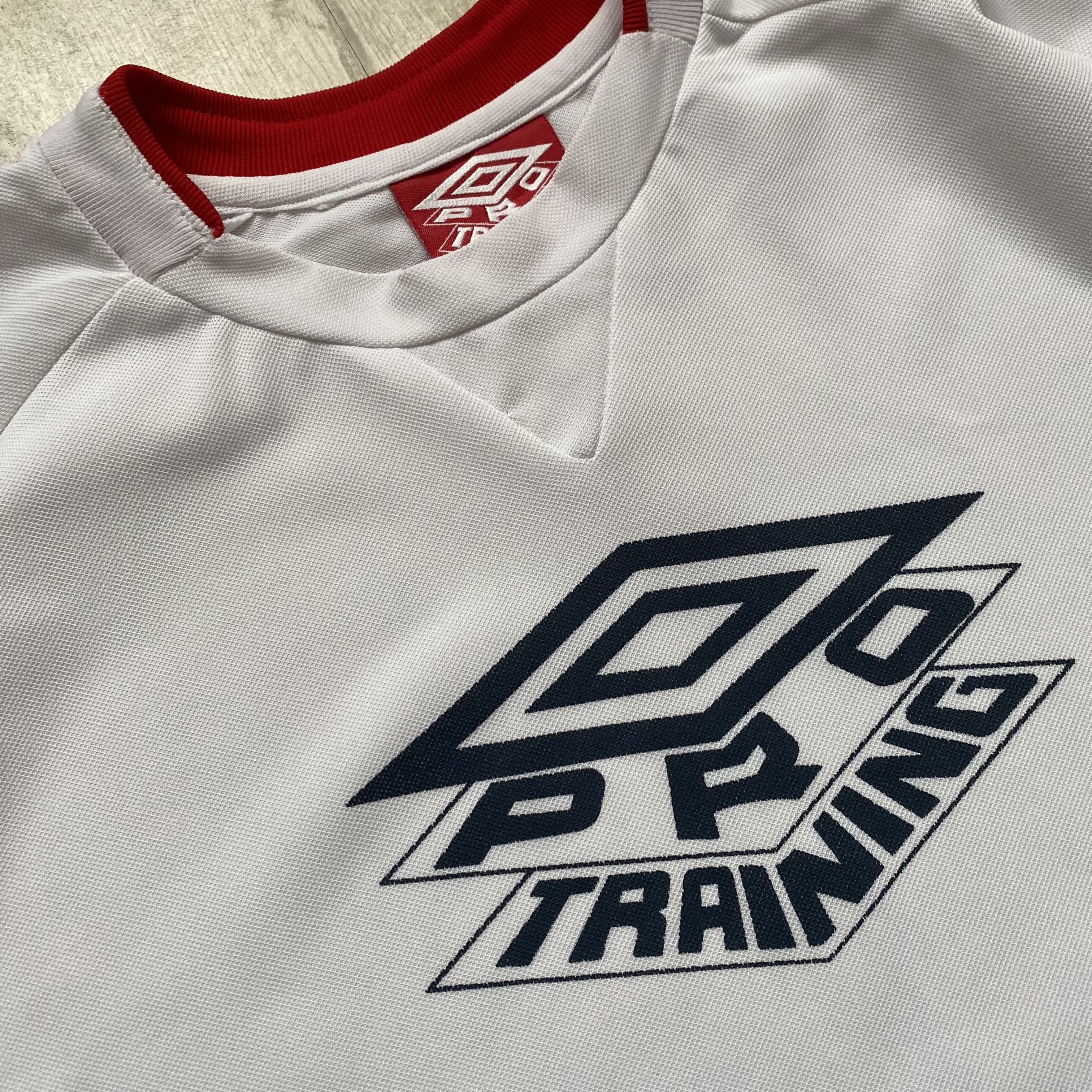 Umbro Drill Vintage 90s Umbro jersey tee Center logo Blockore Size US XXL / EU 58 / 5 - 6 Thumbnail