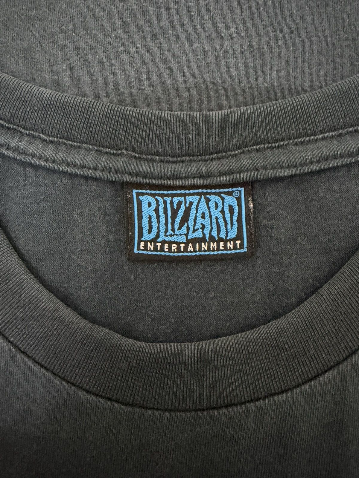 Vintage 🔥 WORLD OF WARCRAFT BY BLIZZARD ENTERTAINMENT GAMING RARE Size US L / EU 52-54 / 3 - 13 Thumbnail