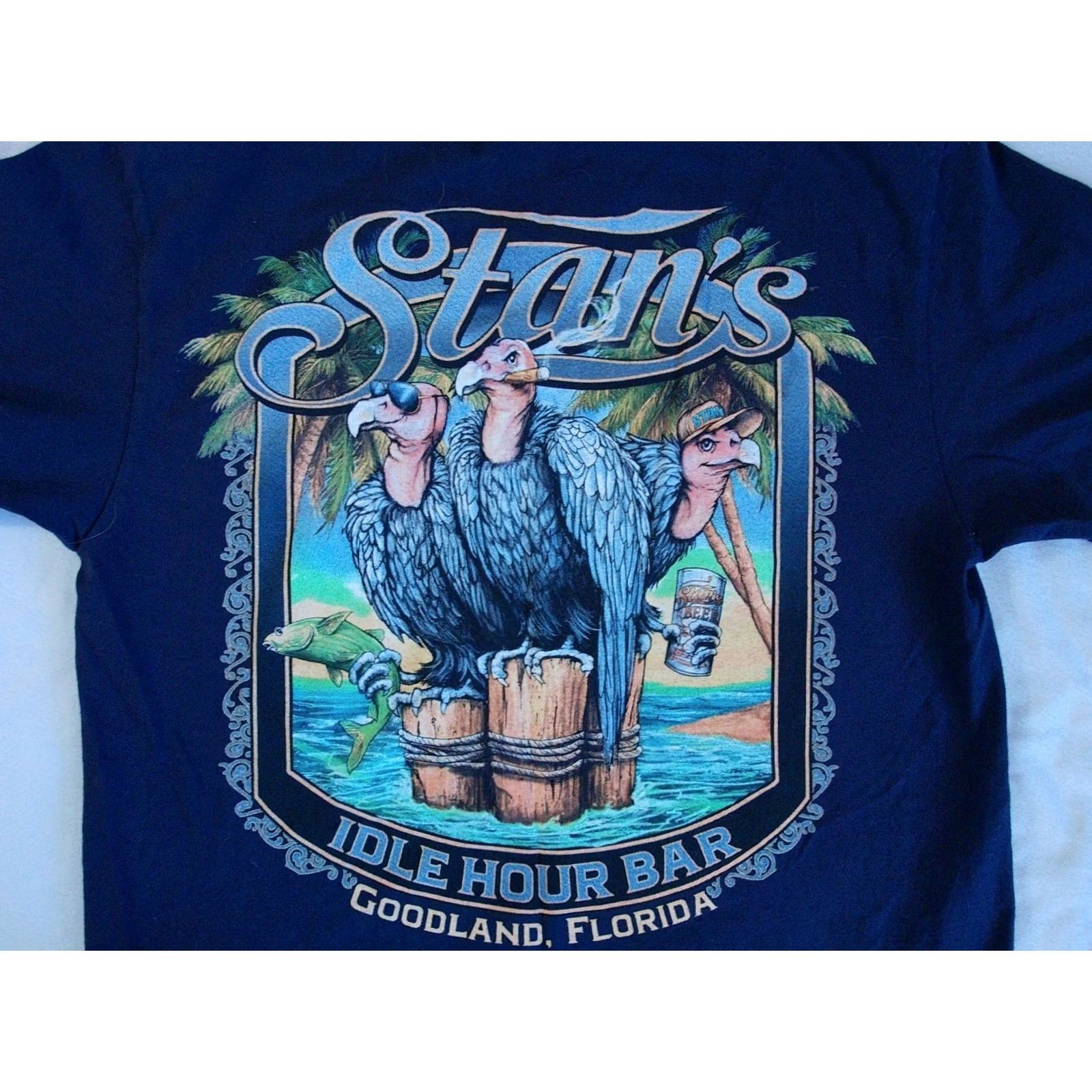Gildan STAN'S IDLE HOUR Bar t Shirt Men's Medium Seafood Waterfront GOODLAND FLORIDA Shirt Men M Blue Graphic Print USA Beach Nautical Florida 2010s Size US M / EU 48-50 / 2 - 4 Thumbnail