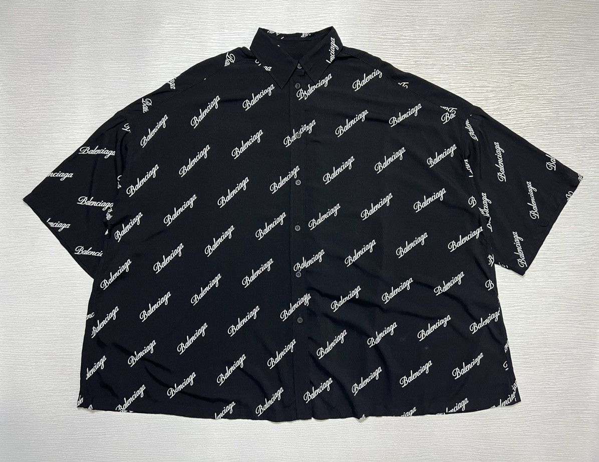 Image of Balenciaga - All Over Script Logo Oversized Button Up Shirt in Black, Women's (Size XS)