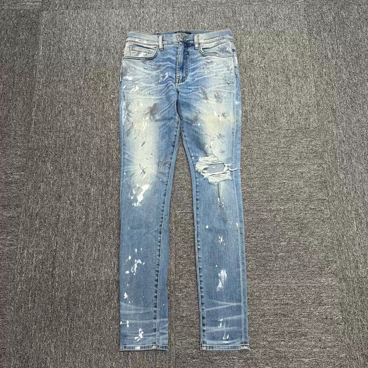 Amiri amiri single-knee distressed paint splatter jeans. Size US 33 - 1 Thumbnail