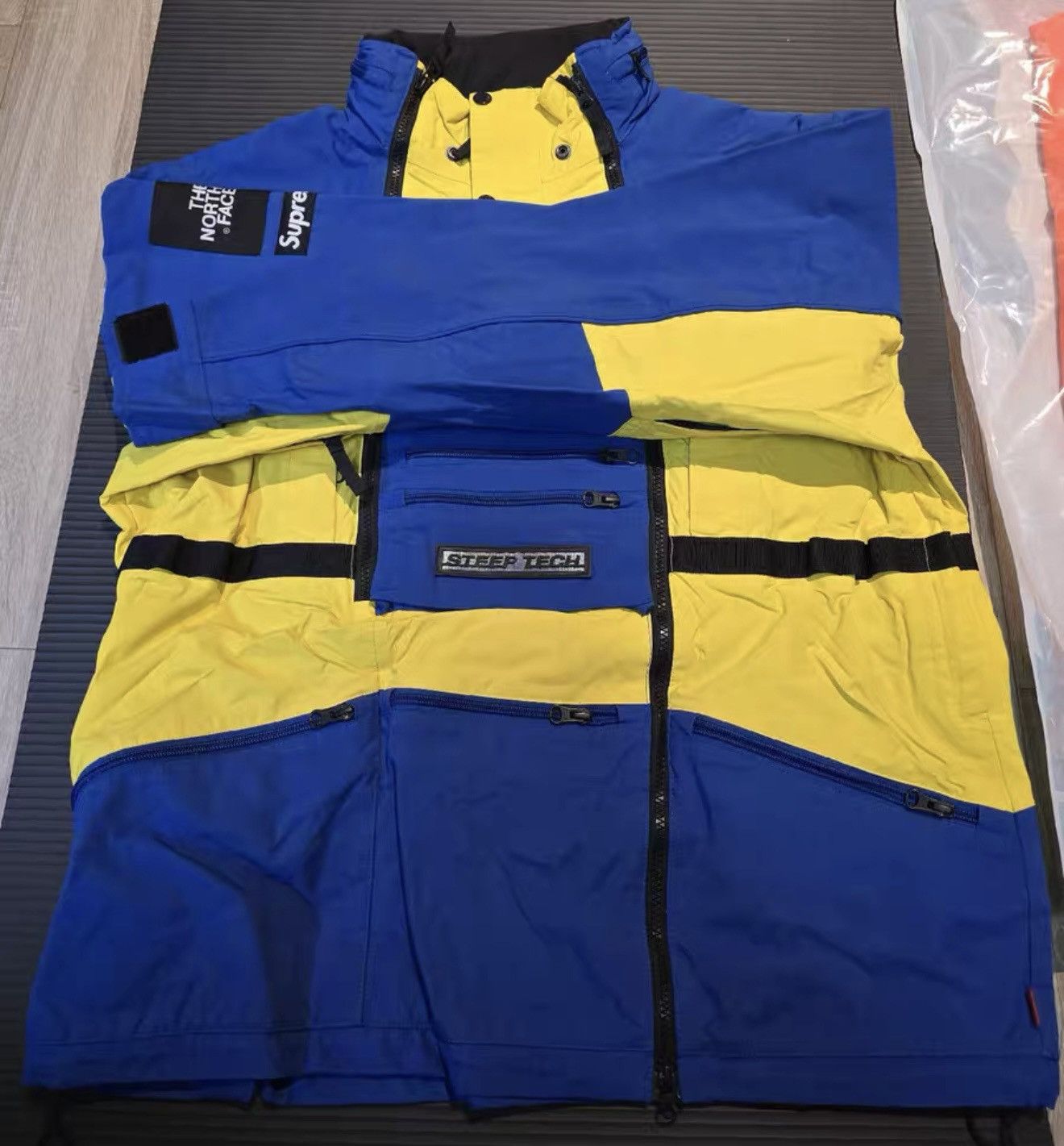 Supreme tnf steep tech blue yellow north face hooded jacket