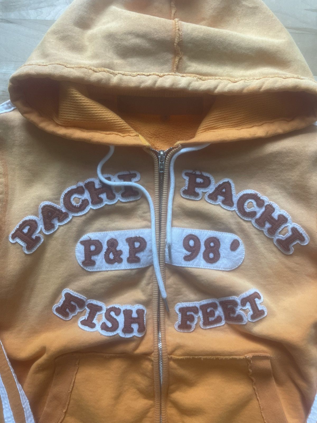 Pachi pachi zip up