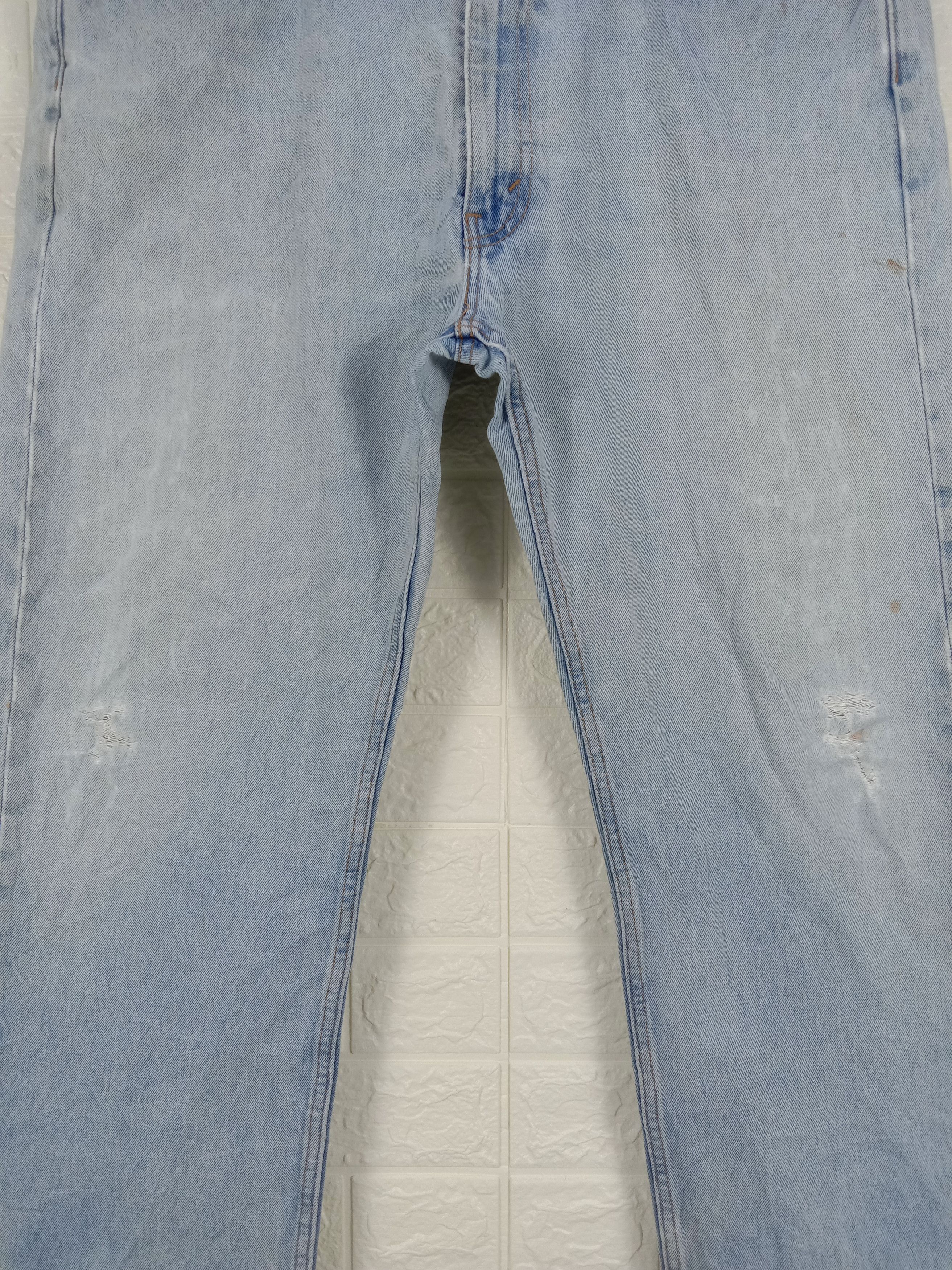 Vintage Levi's 505 Jeans Light Wash Distressed Denim